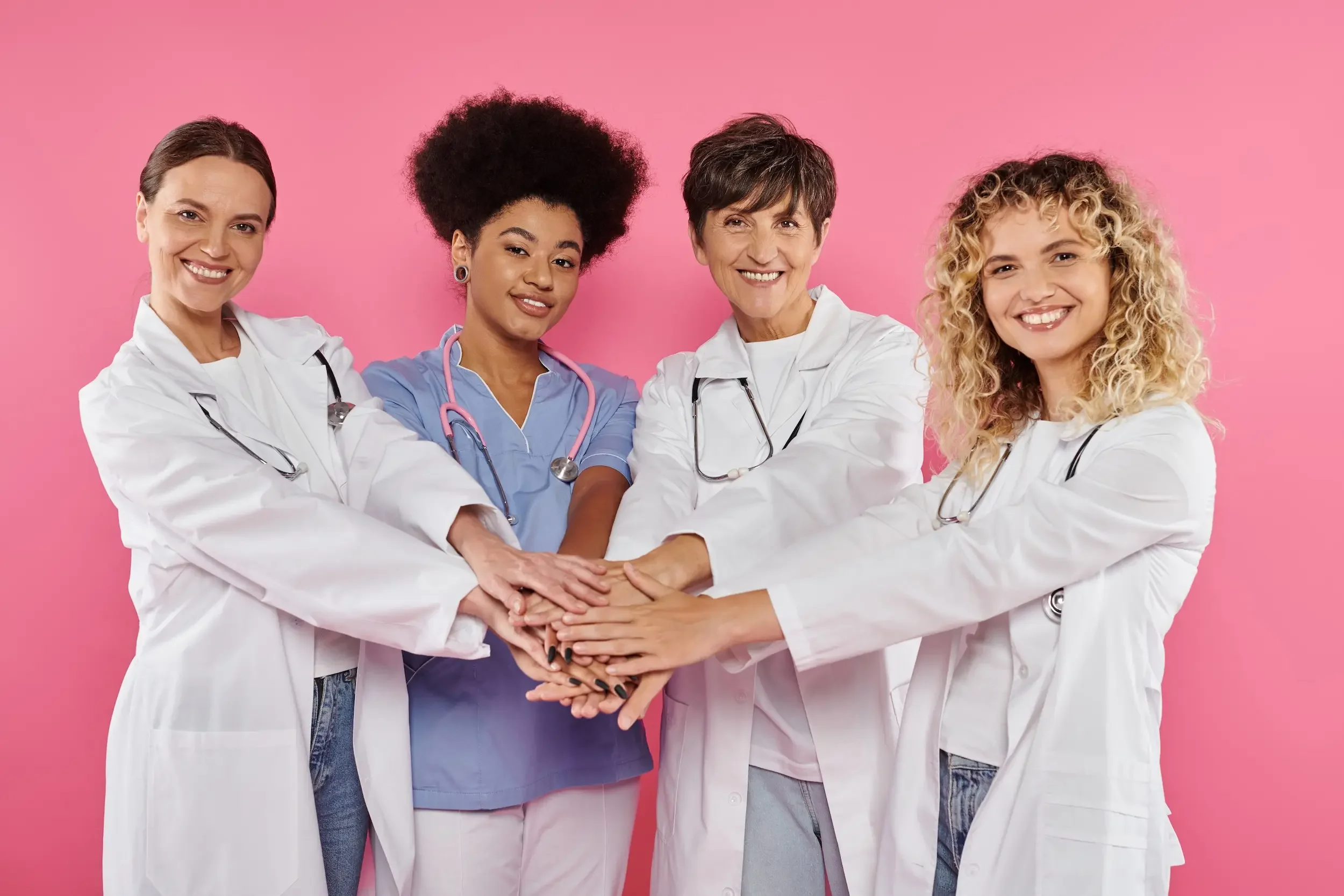 A group of women doctors celebrating women in medicine.