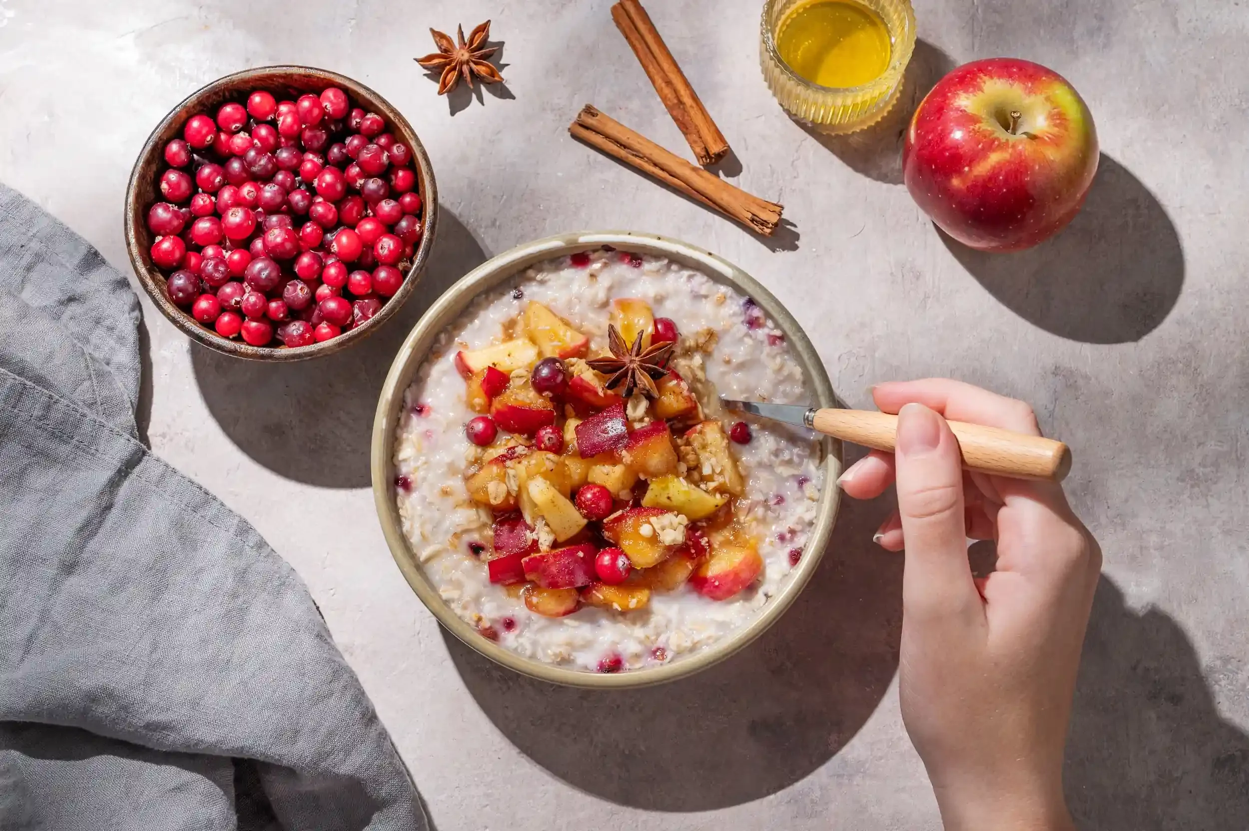 A healthy breakfast with fruit and oatmeal.
