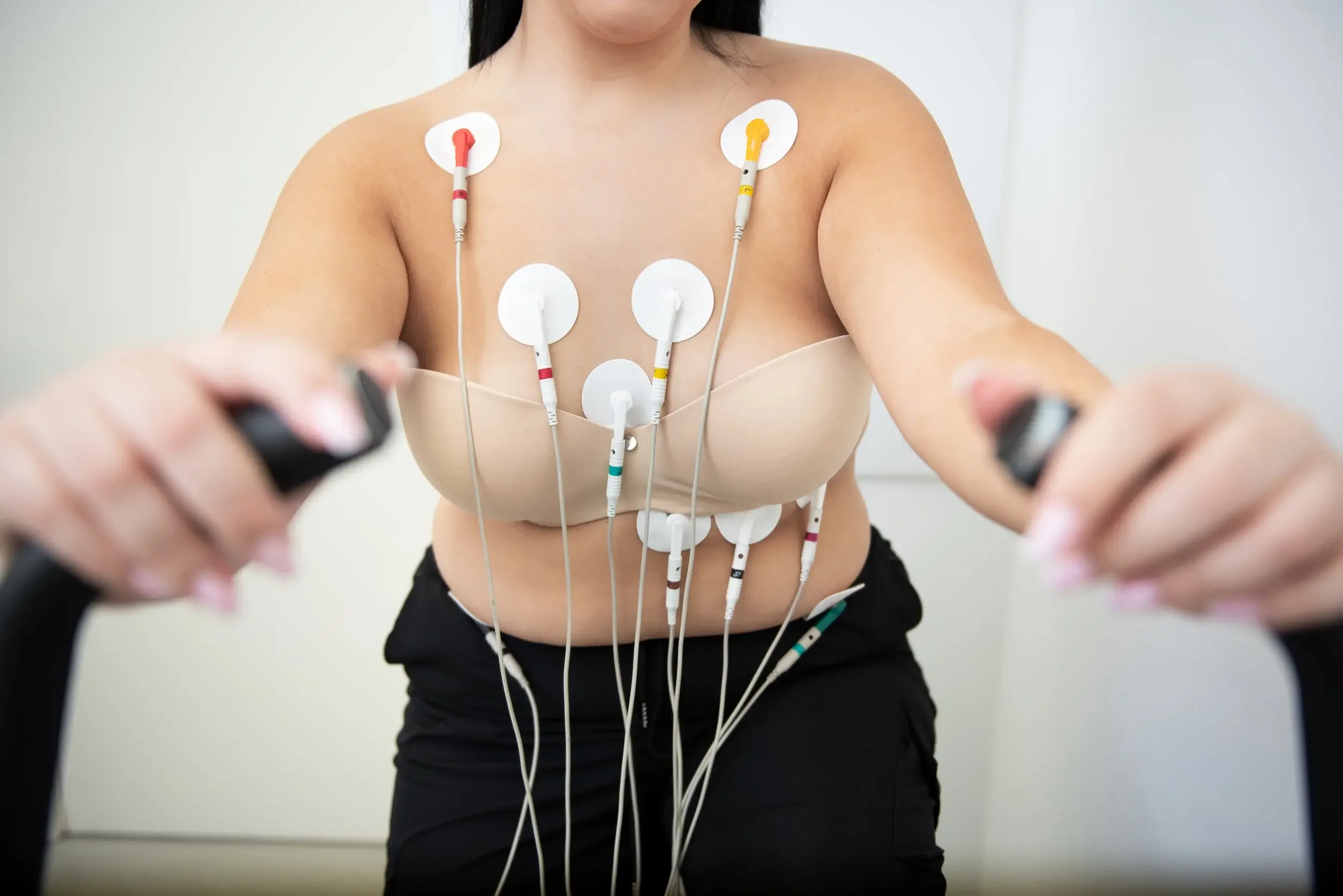 A woman having a heart stress test.