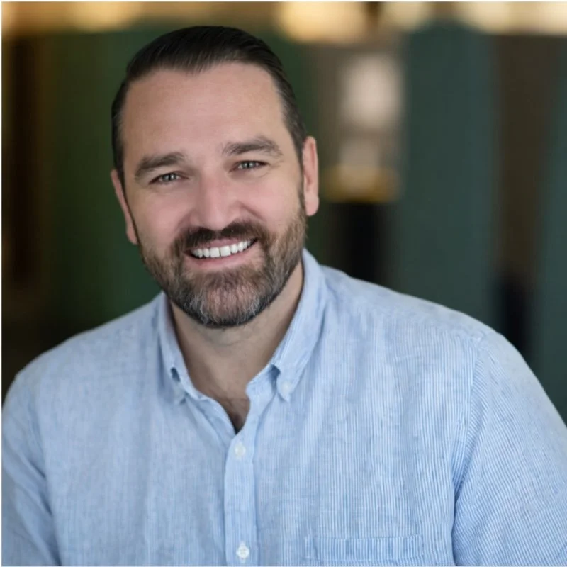 Portrait of Jim Bialick in a light blue shirt