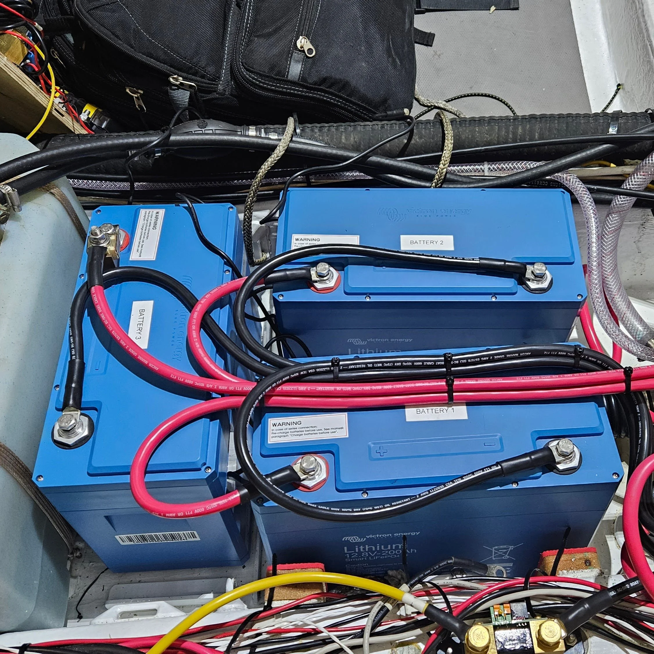 Lithium and AGM system design, charging optimization, solar/wind/hydro integration, inverters, and monitoring.