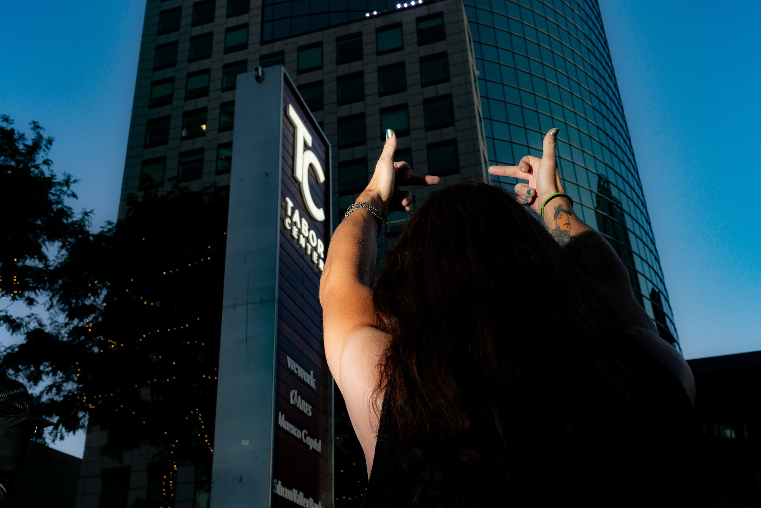 Man flips off "Palantir" building during Anti-Fascism Demonstration, Denver, 2025
