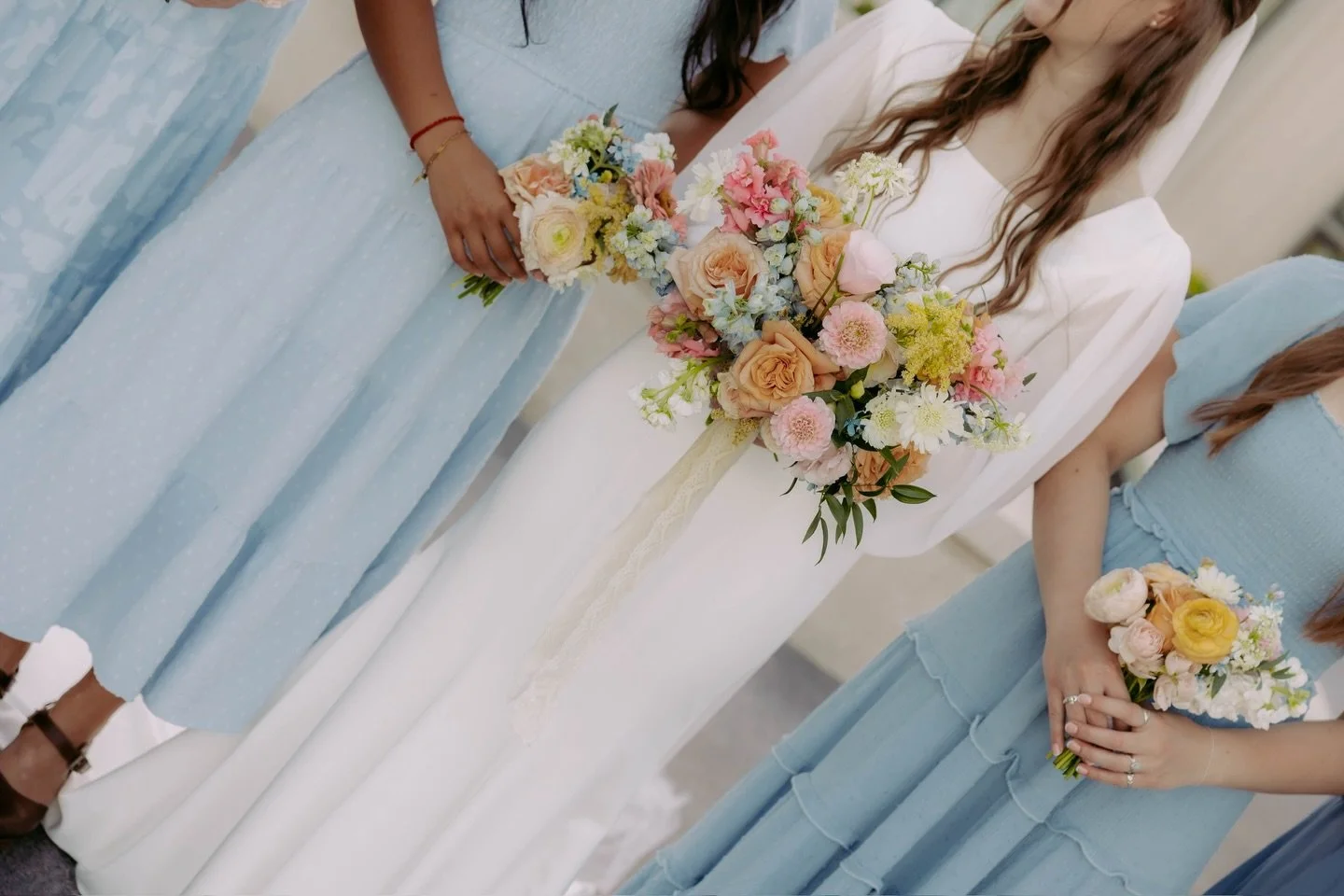 A moment for the bride &amp; the bridesmaids🩵👏

Photographer: @kinleyperkins.photo 
Dress: @fantasybridalut 

2026 brides! Check florals off your to-do list and dm us to set up a free consultation!✨

&bull;
&bull;
&bull;

#idahoflorist #utahflorist
