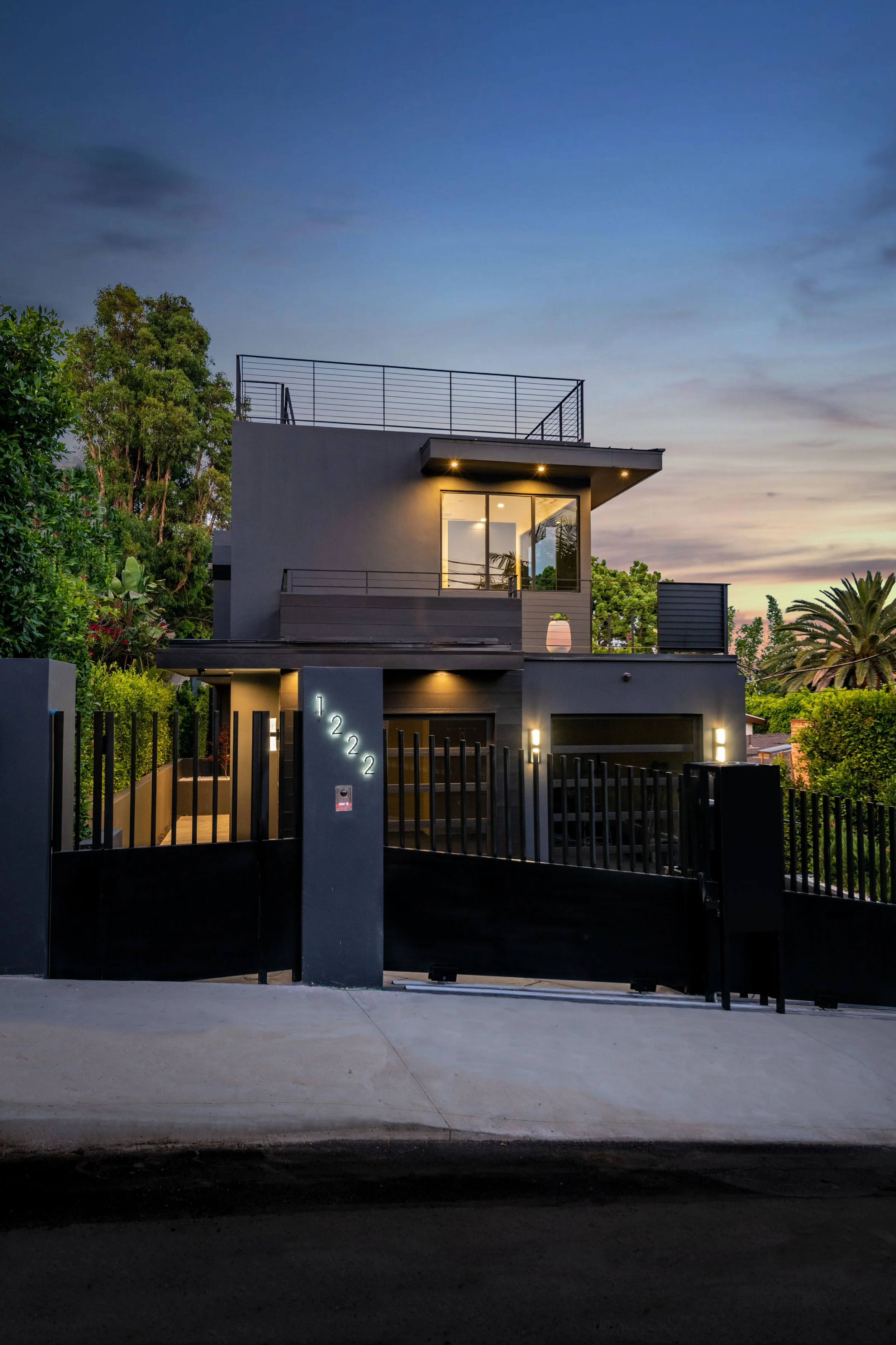 Hilldale at 1222 — black stucco new construction