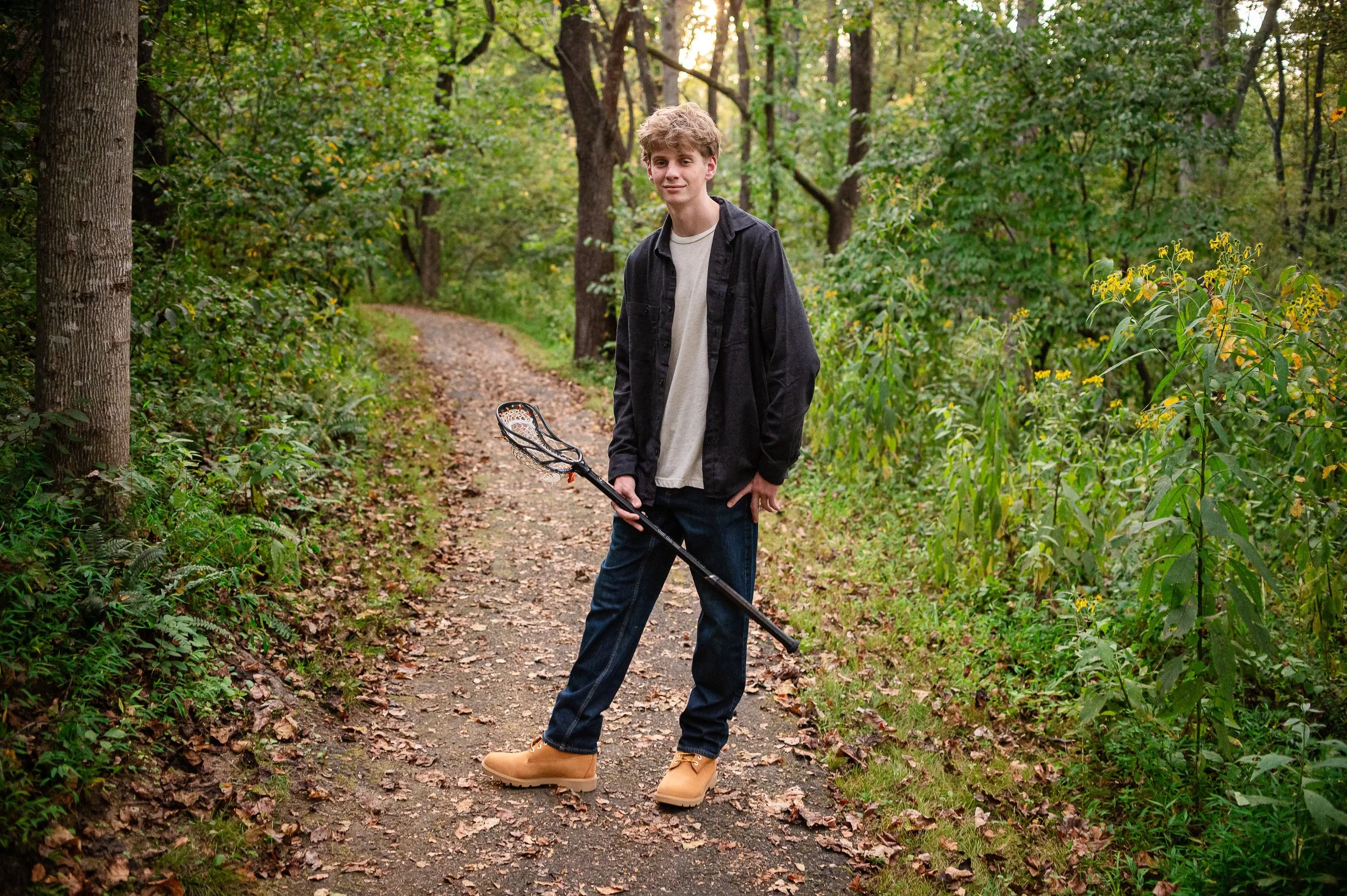 erin-e-gallagher-photography-fall-charlottesville-woods-forest-senior-boy-lacrosse.jpg