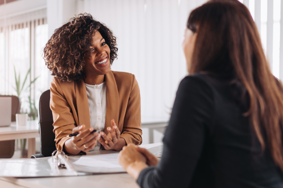 Woman smiling at another woman – How to Use HARO for SEO