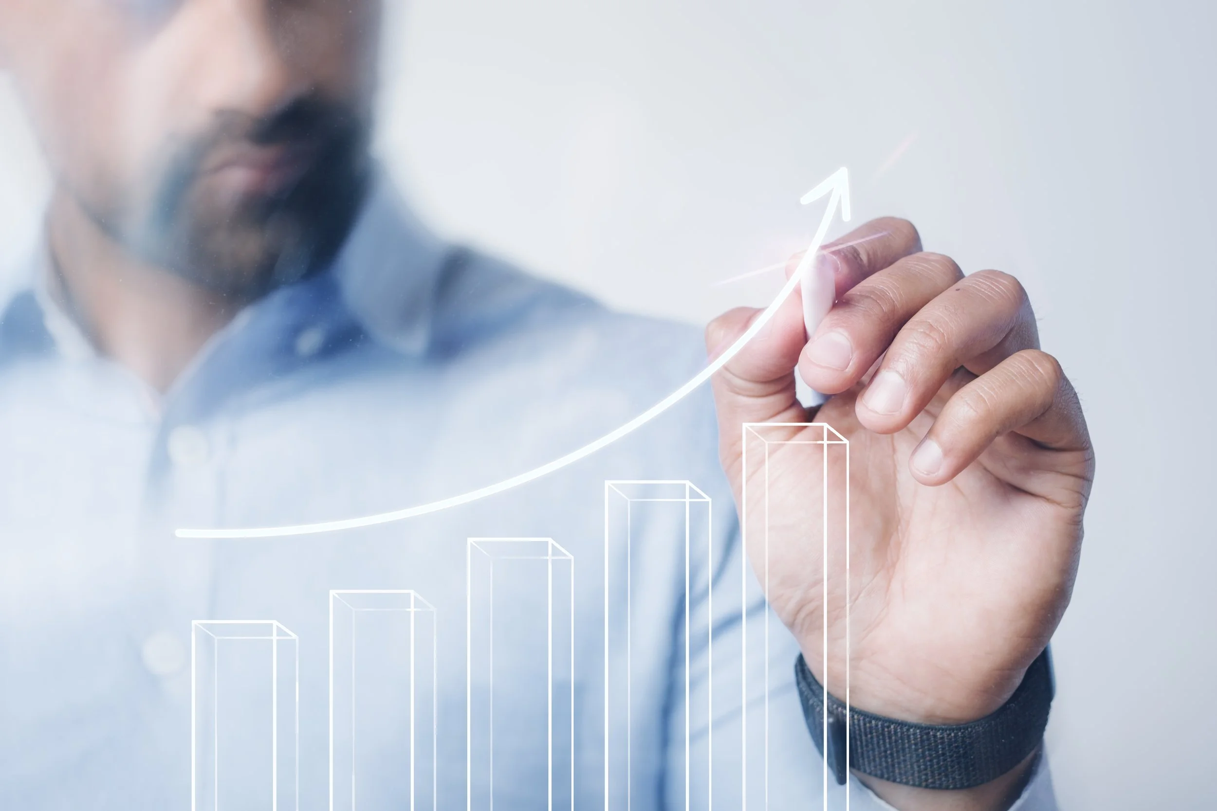 A man illustrating his practice's growth - The Private Practice Pro