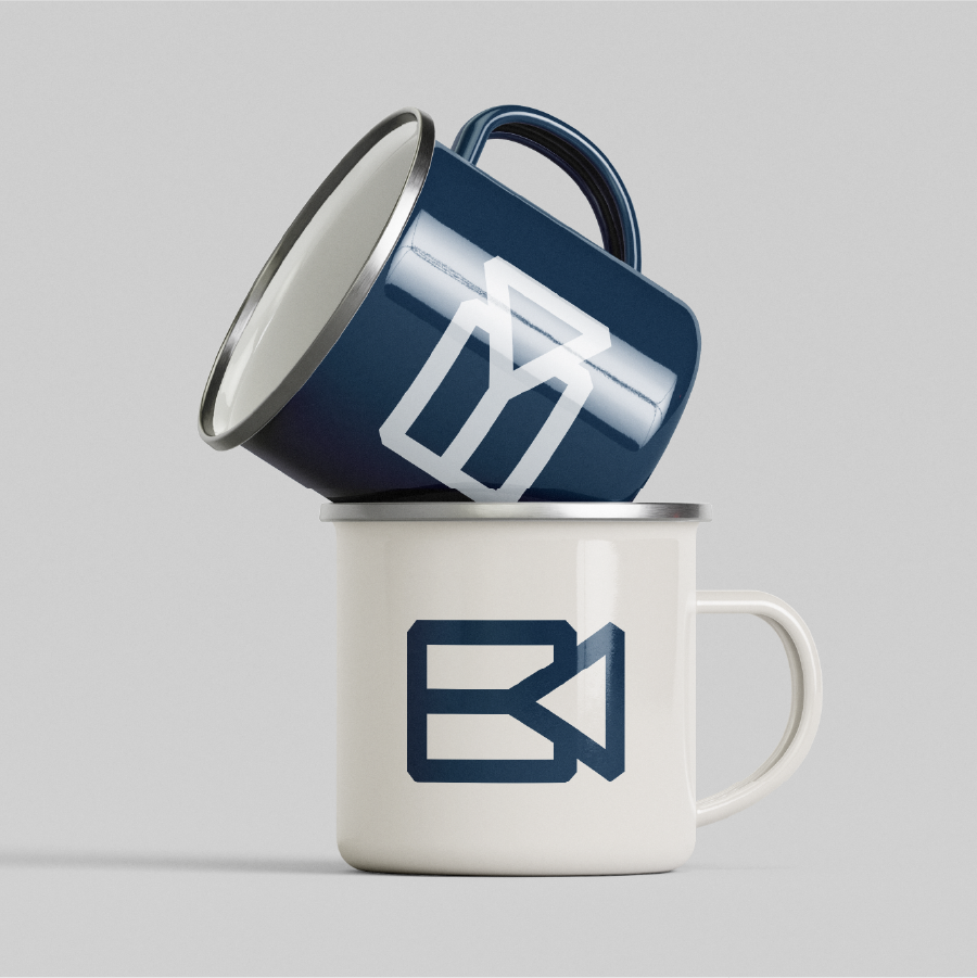 Bobby Palacios branded coffee mugs featuring the custom photography and videography logo.