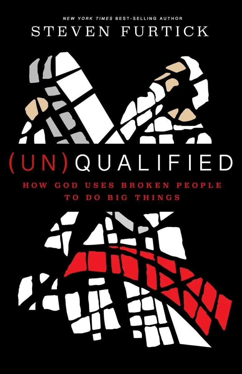 Book cover for '(Un)Qualified' by Steven Furtick, featuring a black background with a stylized cracked and broken boxing glove design, and the title in white, red, and black text.