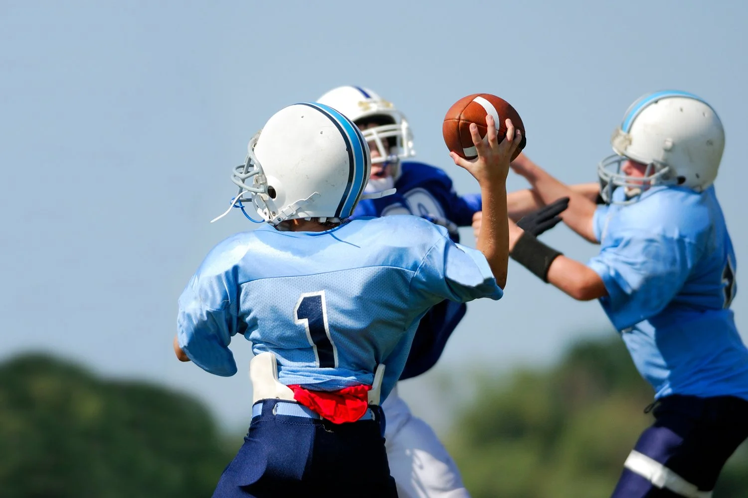 Should My Child Play Other Sports If They’re a Quarterback?