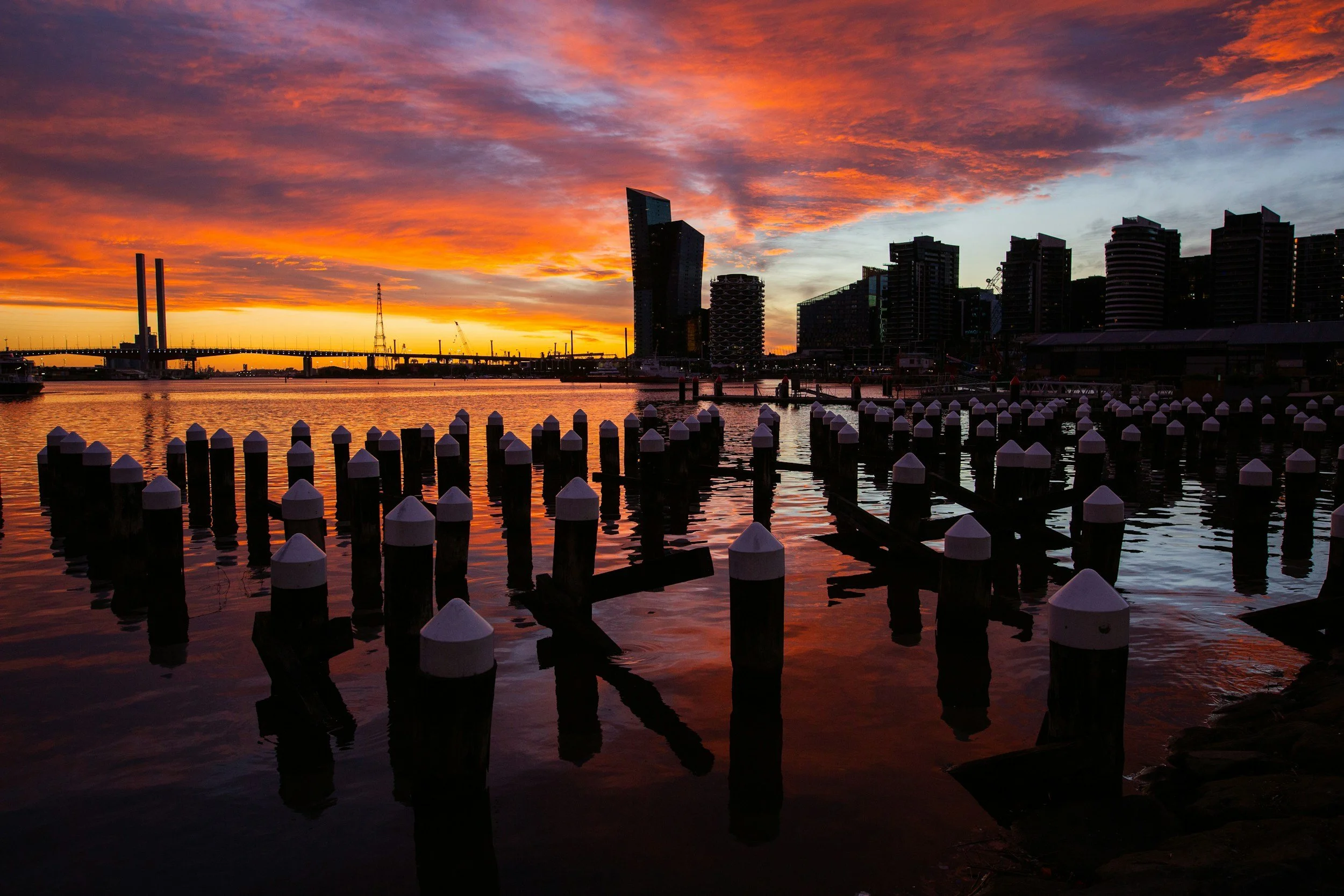 The Docklands sunset with a backdrop of Bridges, wharfs and skyscrapers offer so many different angles to enjoy Melbournes skyline.