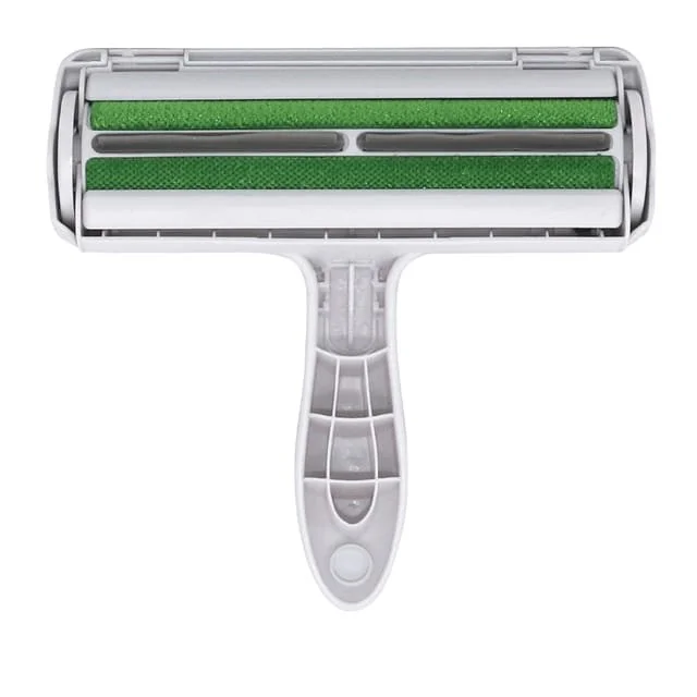 A white razor with a handle and a green and gray blade cartridge.