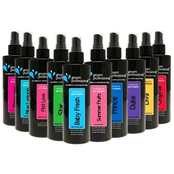 Collection of grooming spray bottles with colorful labels and black spray caps