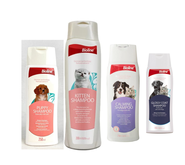 Four bottles of Bioline shampoo for pets, including puppy, kitten, calming, and glossy coat formulas.
