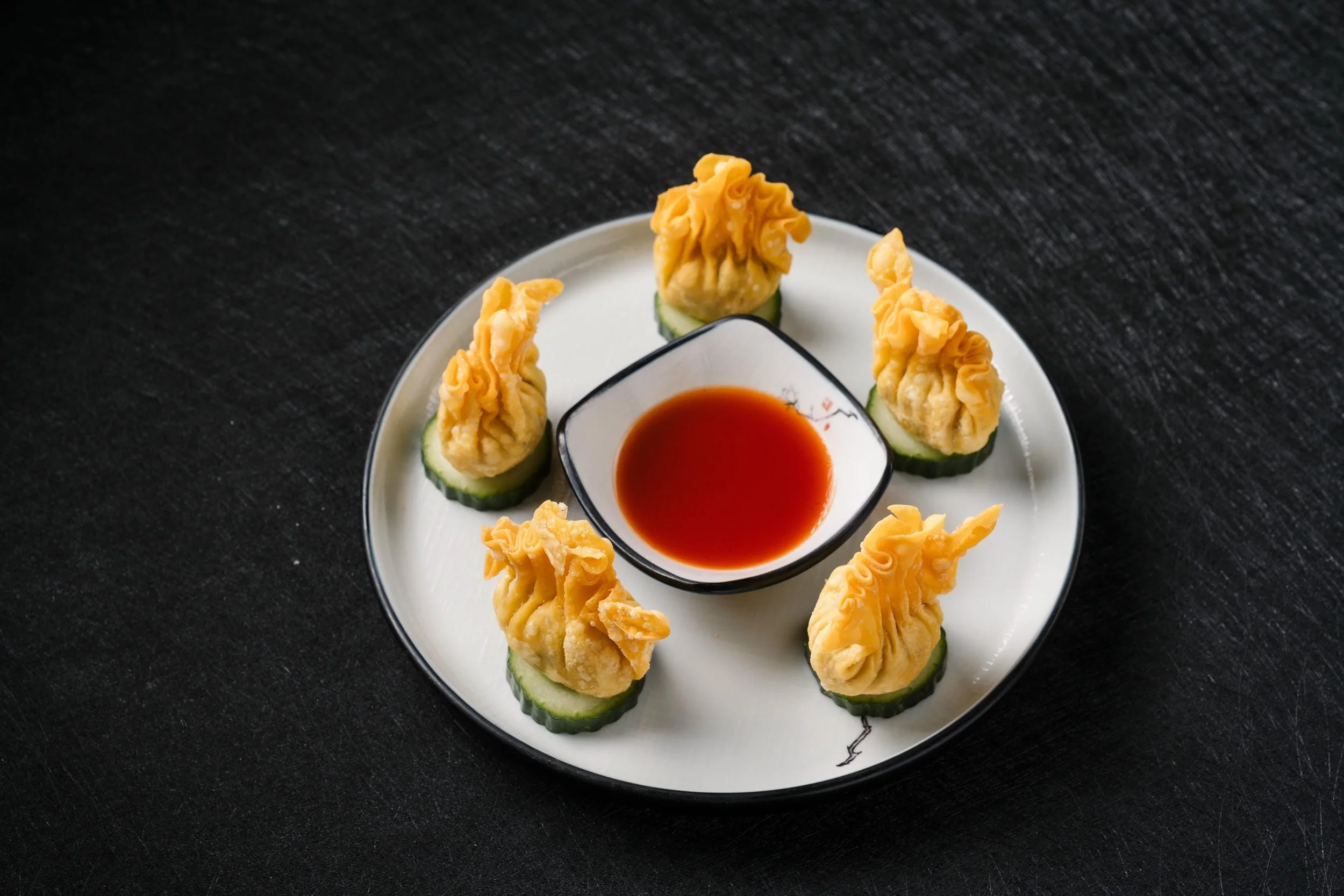 Fried Wontons With Sweet & Sour Sauce $25