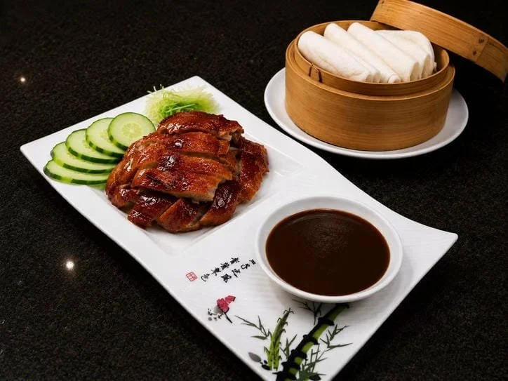 Duck Bao With Steamed Buns and Hoisen Sauce $48