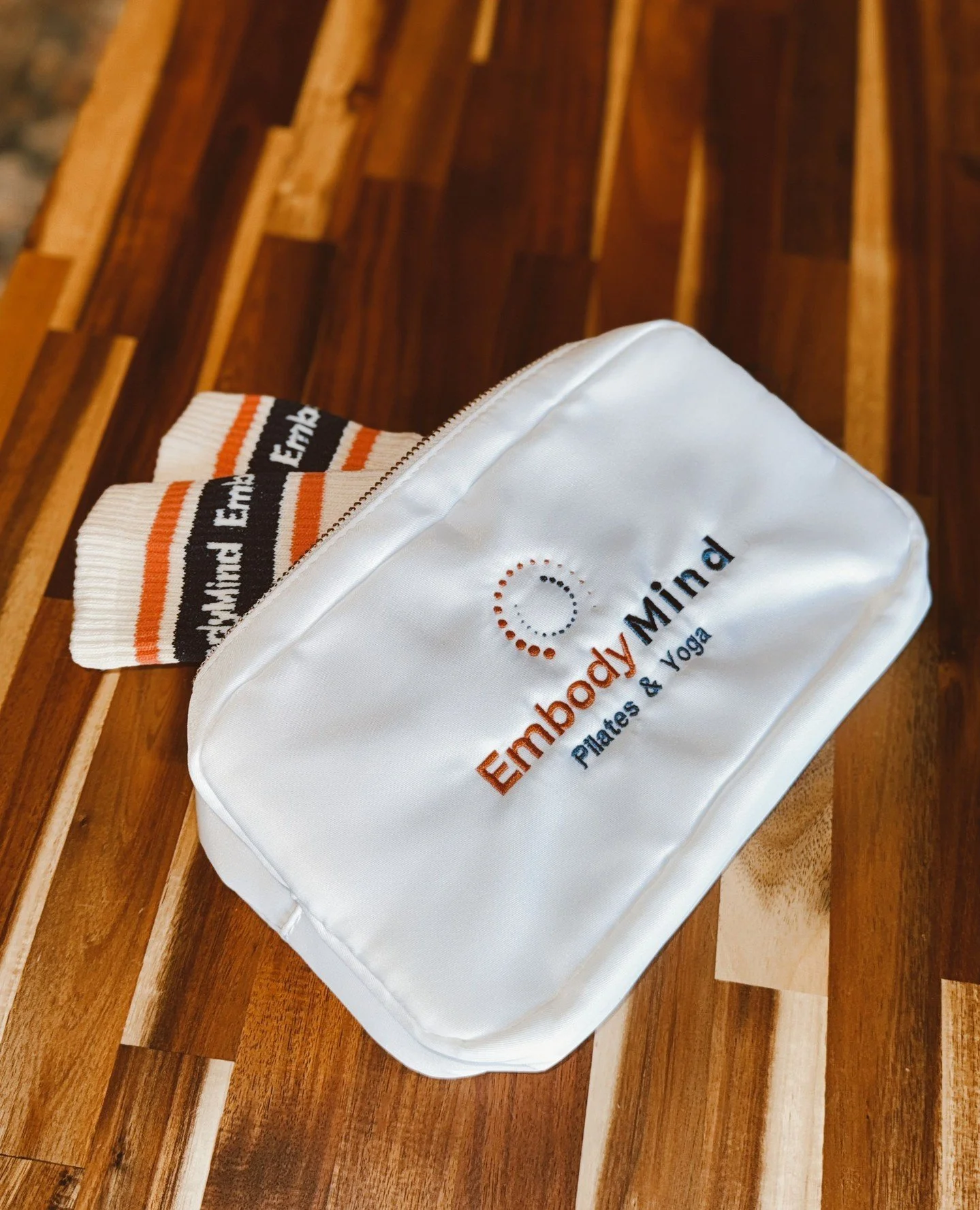 What&rsquo;s in your studio bag?⁠
Grip socks. Lip balm. Maybe snacks.⁠
⁠
Our EmbodyMind pouch + socks are ready for class.