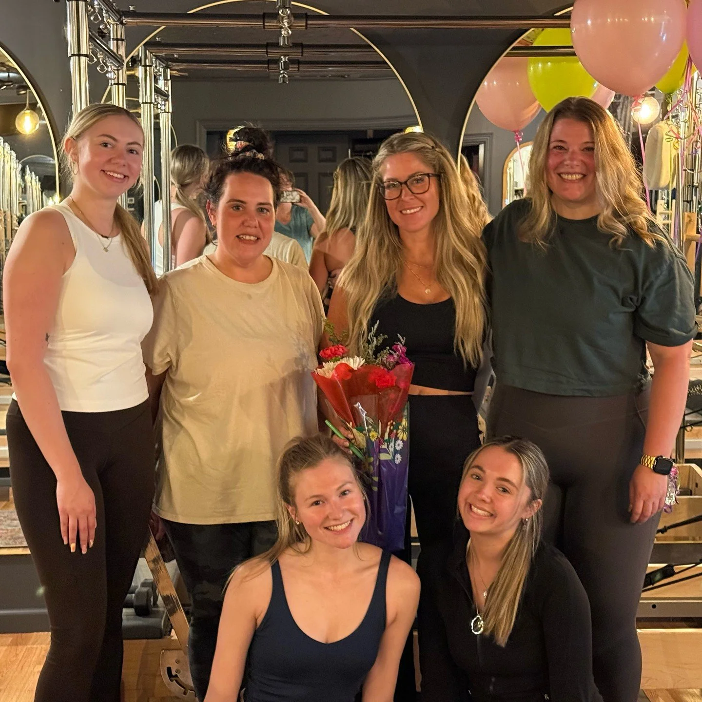 A little birthday love for Meghan 🤍🎈⁠
⁠
Yesterday, Meghan&rsquo;s 10 AM class surprised her with flowers, balloons, gifts, and a whole lot of love for her birthday 🥹⁠
⁠
One of our favorite things about EmbodyMind is the community that happens here
