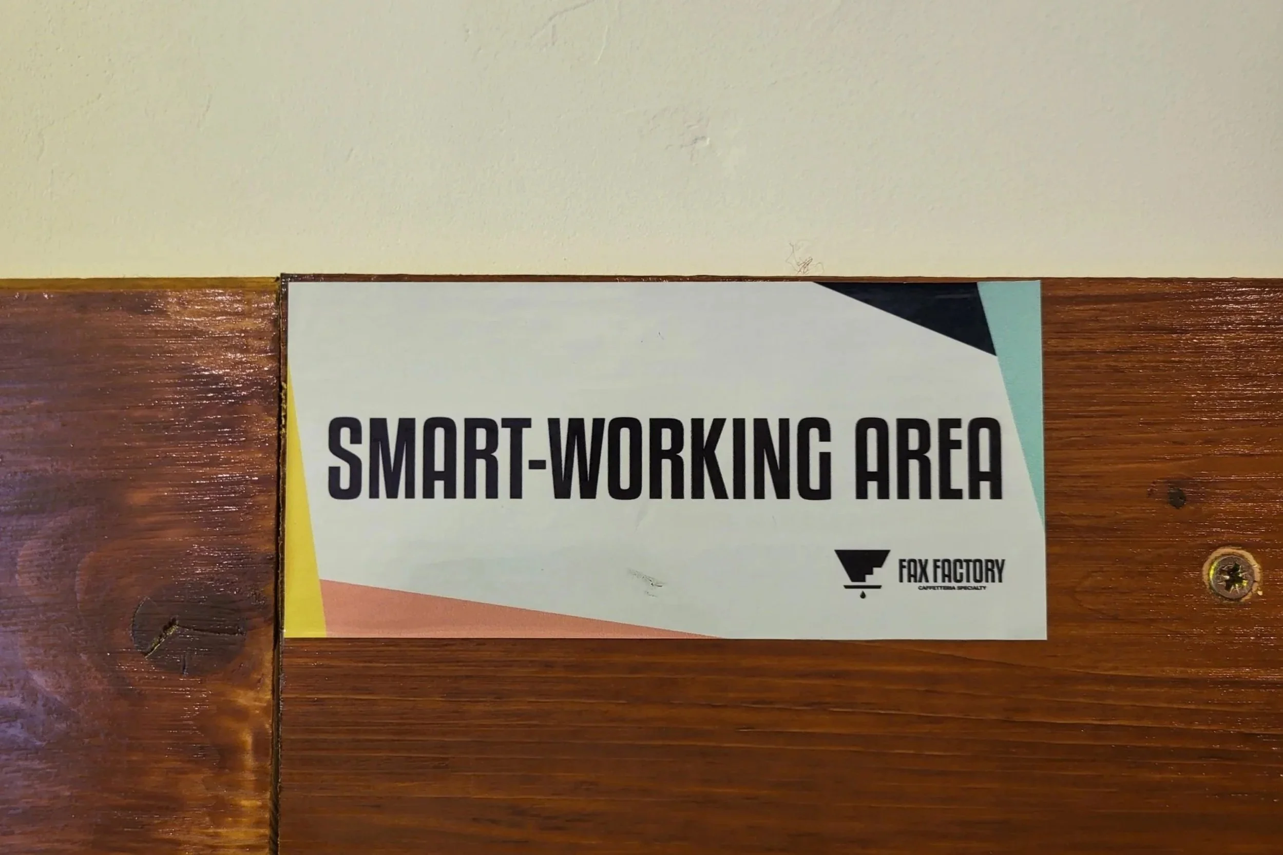 Remote working setup in Fax Factory a Pigneto café