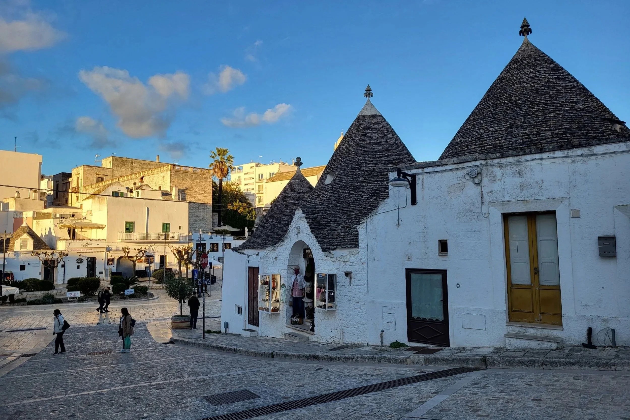 view of Alberobello showing multiple traditional trulli houses.