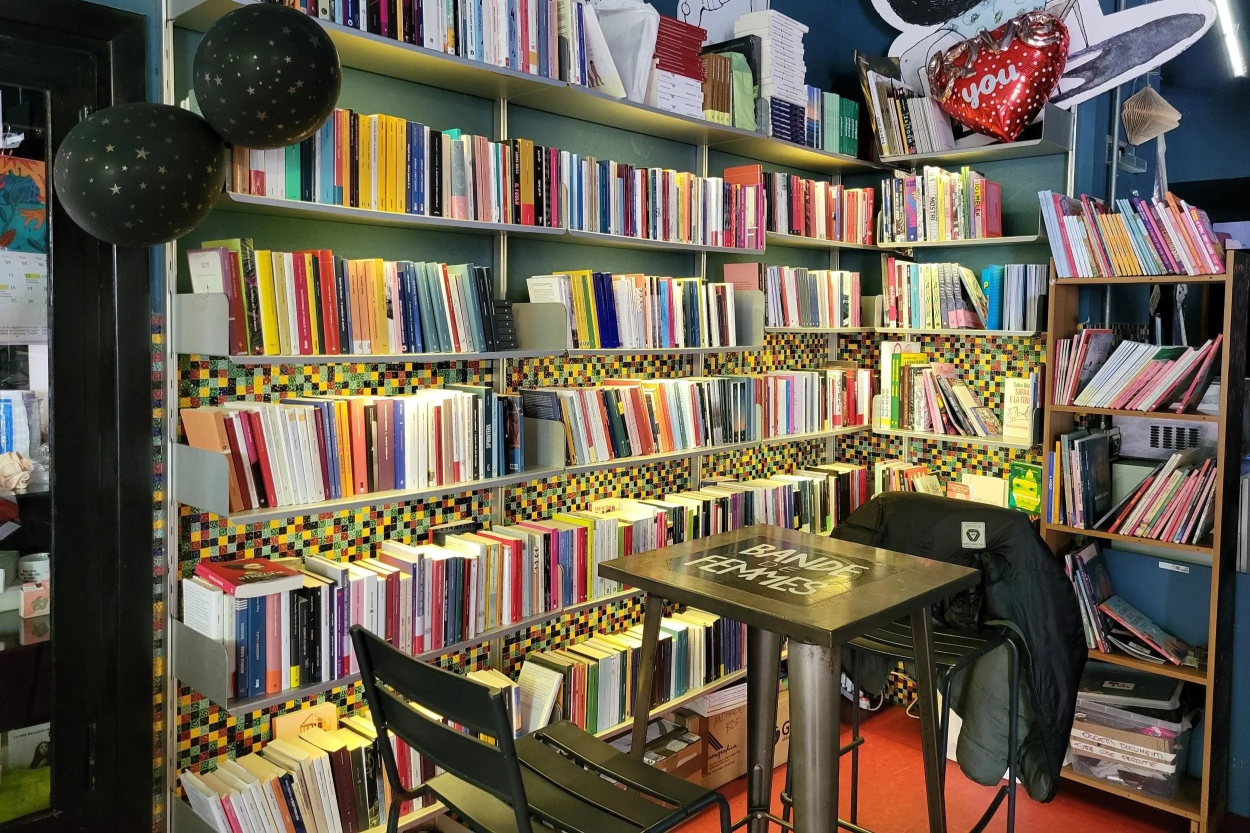 Bookshelfs filled with books at Libreria Tuba Pigneto Rome