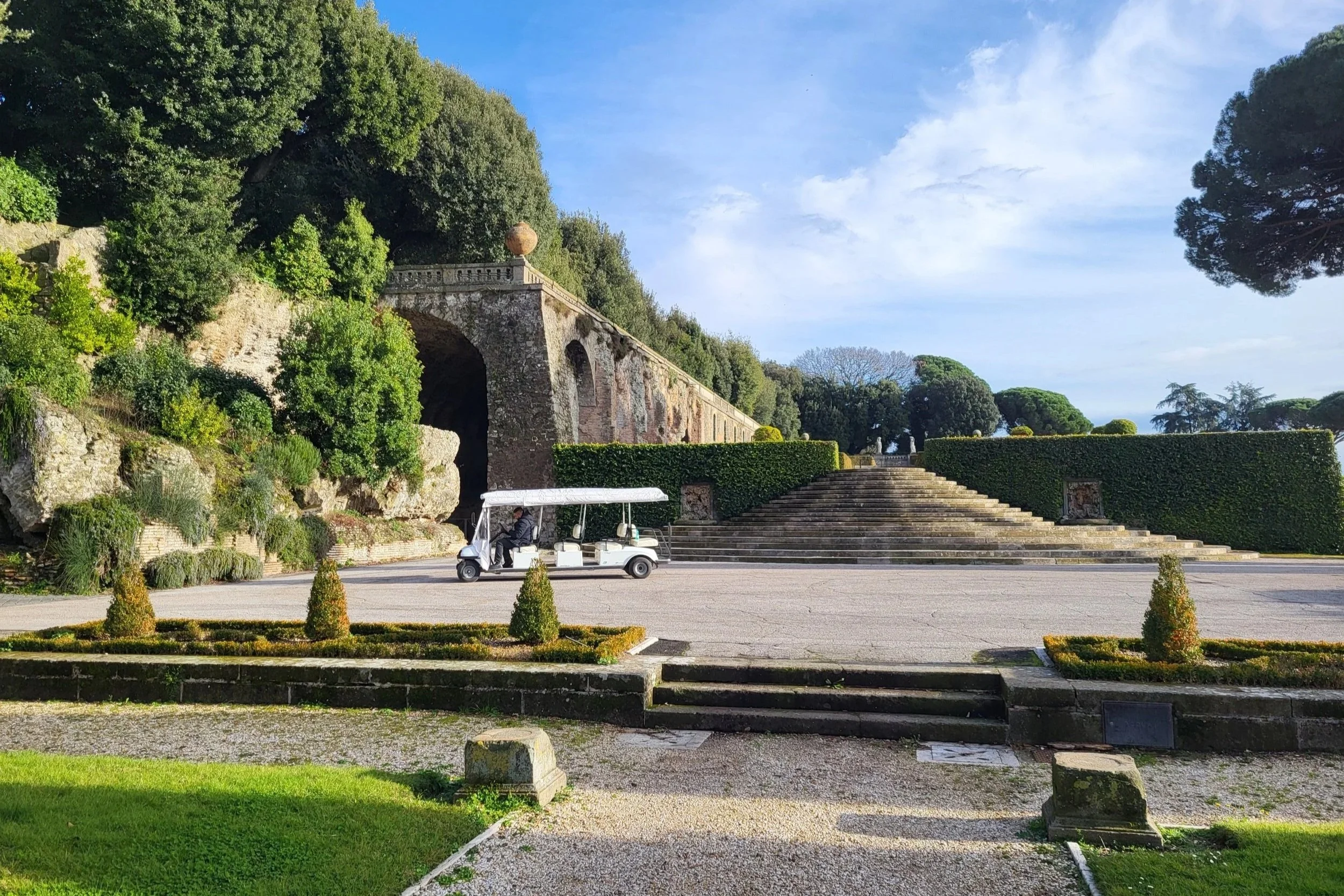 Golf cart in the gardens of Borgo Laudato Si’