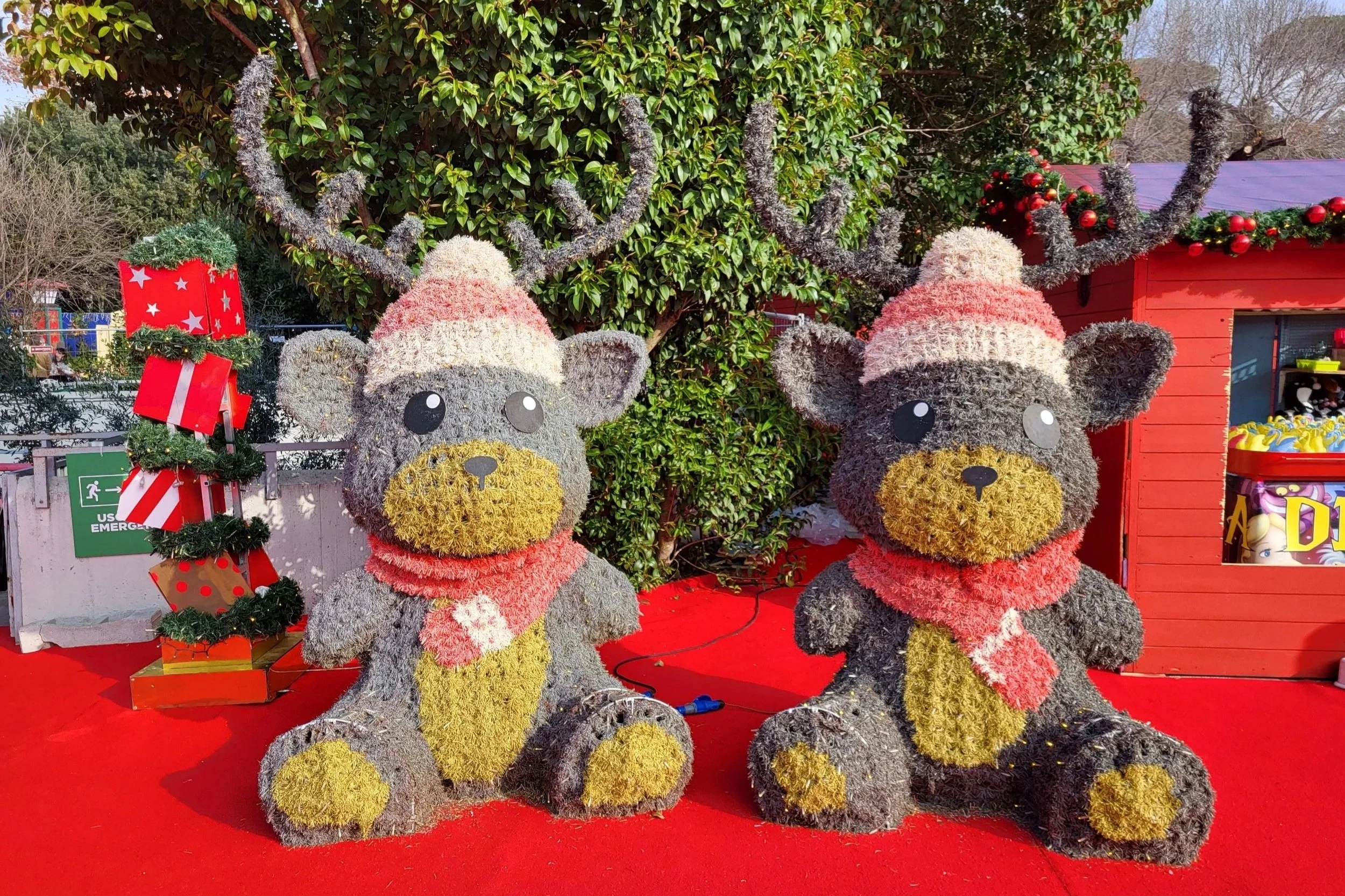 two decoration reindeers next to each other at Christmas World Rome