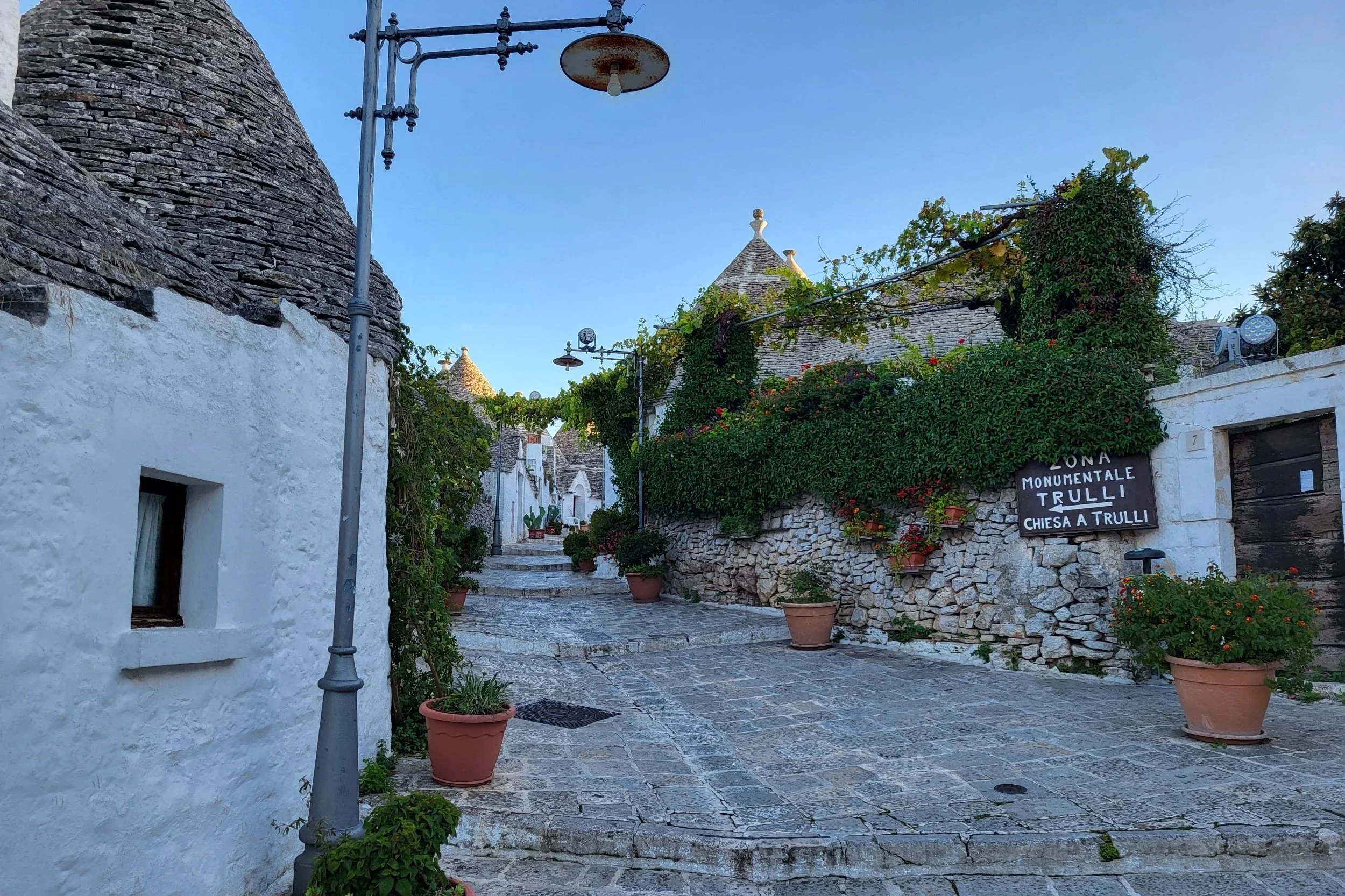 Trulli buildings in Alberobello, Puglia, Italy with conical stone roofs.