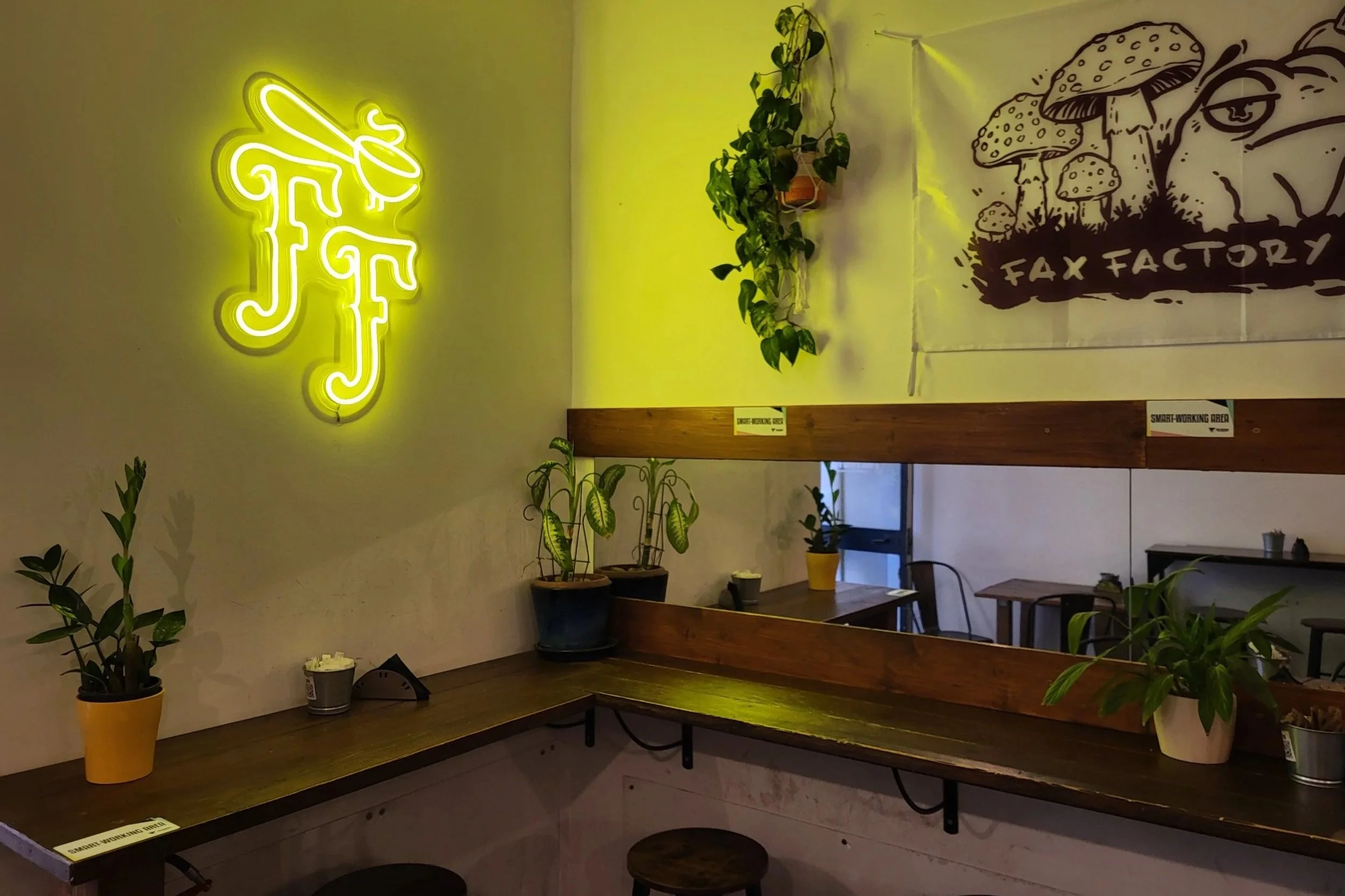 Laptop-friendly workspace in Fax Factory, Pigneto, Rome