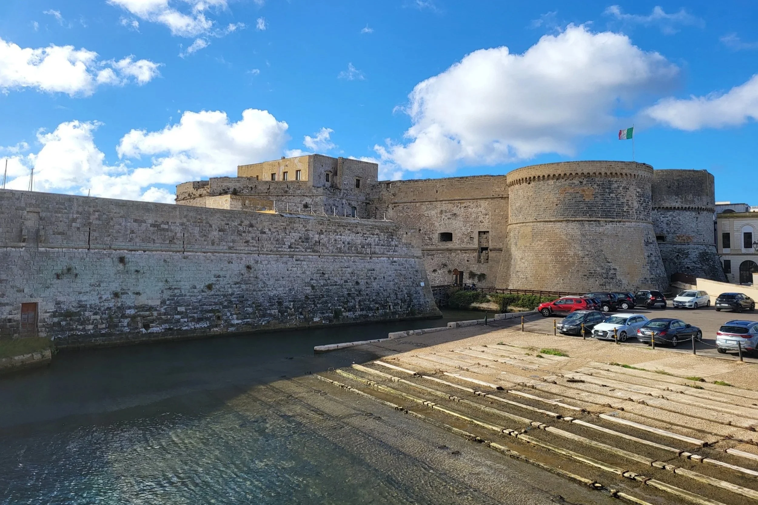 View of the Castle of Gallipoli with a parking lot in front
