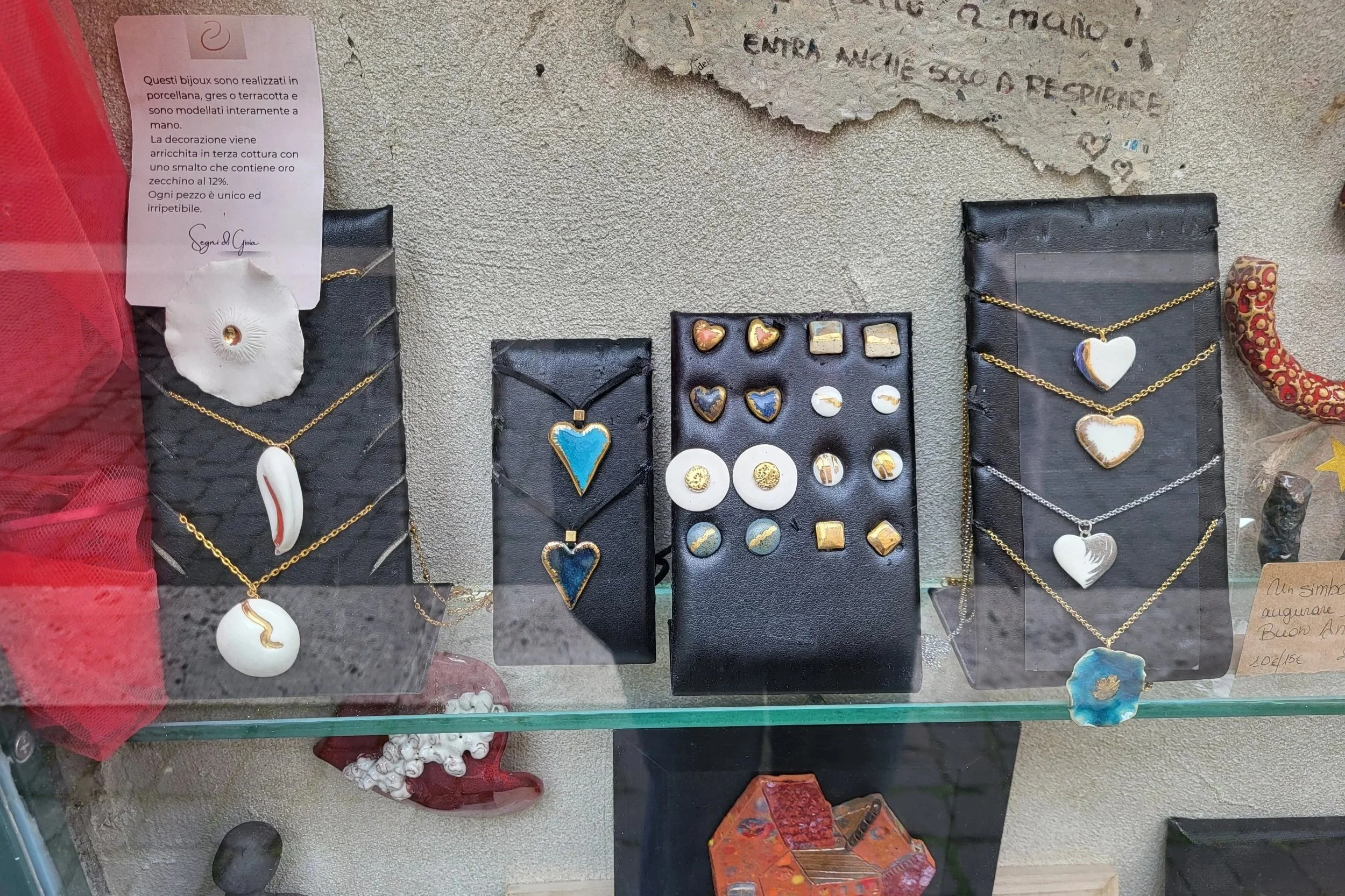 Necklaces on display in a store in Castel Gandolfo
