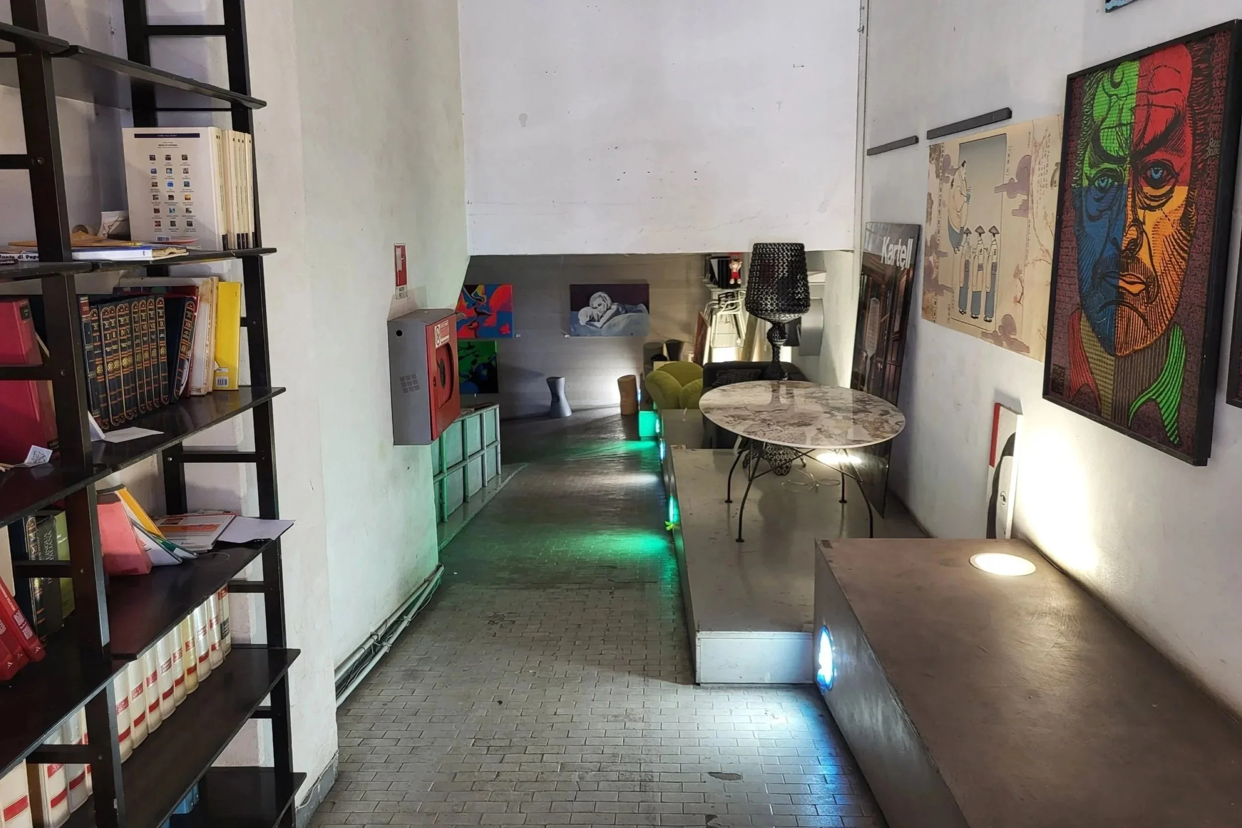 Entrance hallway into the basement of Caffè Letterario in Rome Ostiense