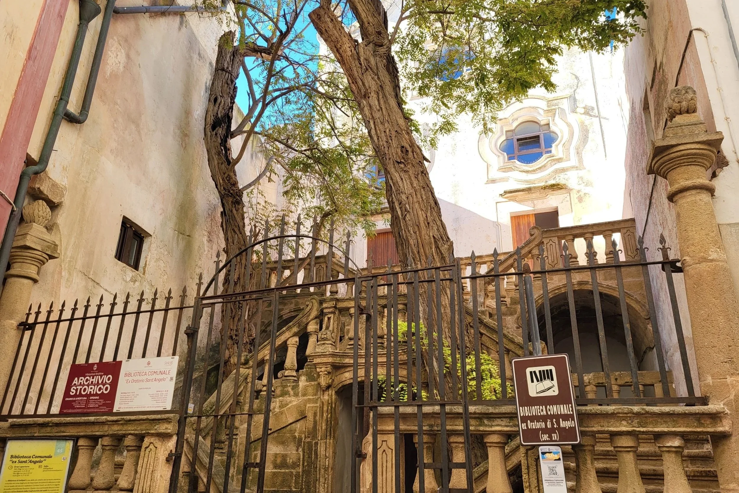 Ex Oratorio Sant’Angelo library with its beautiful staircase and trees