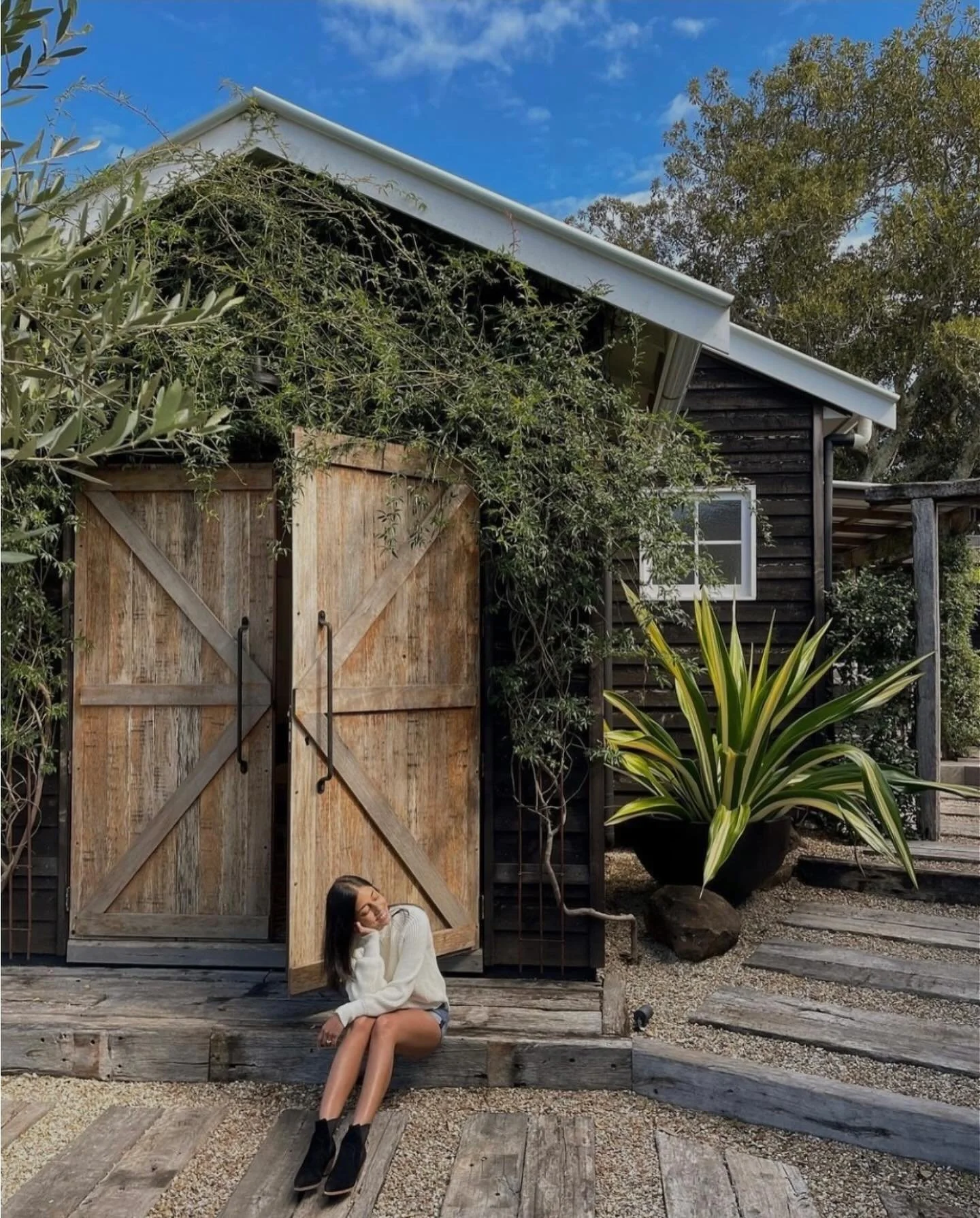 Escape to rustic elegance. 
Tucked beneath the vines and bathed in golden light, our luxury guest barn is your perfect countryside retreat. Think cozy mornings, warm night snuggles by the fire, tranquil views, and timeless design, where every detail 