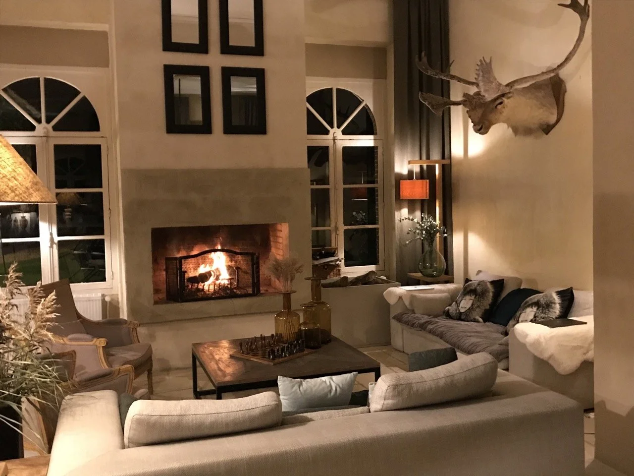Luxury Villa near Paris Perche sofa fireplace living room