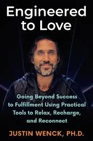 Poster with the quote 'Engineered to Love' and a photo of Justin Wenck, Ph.D., with additional text about going beyond success through practical tools for relaxation, recharging, and reconnecting.