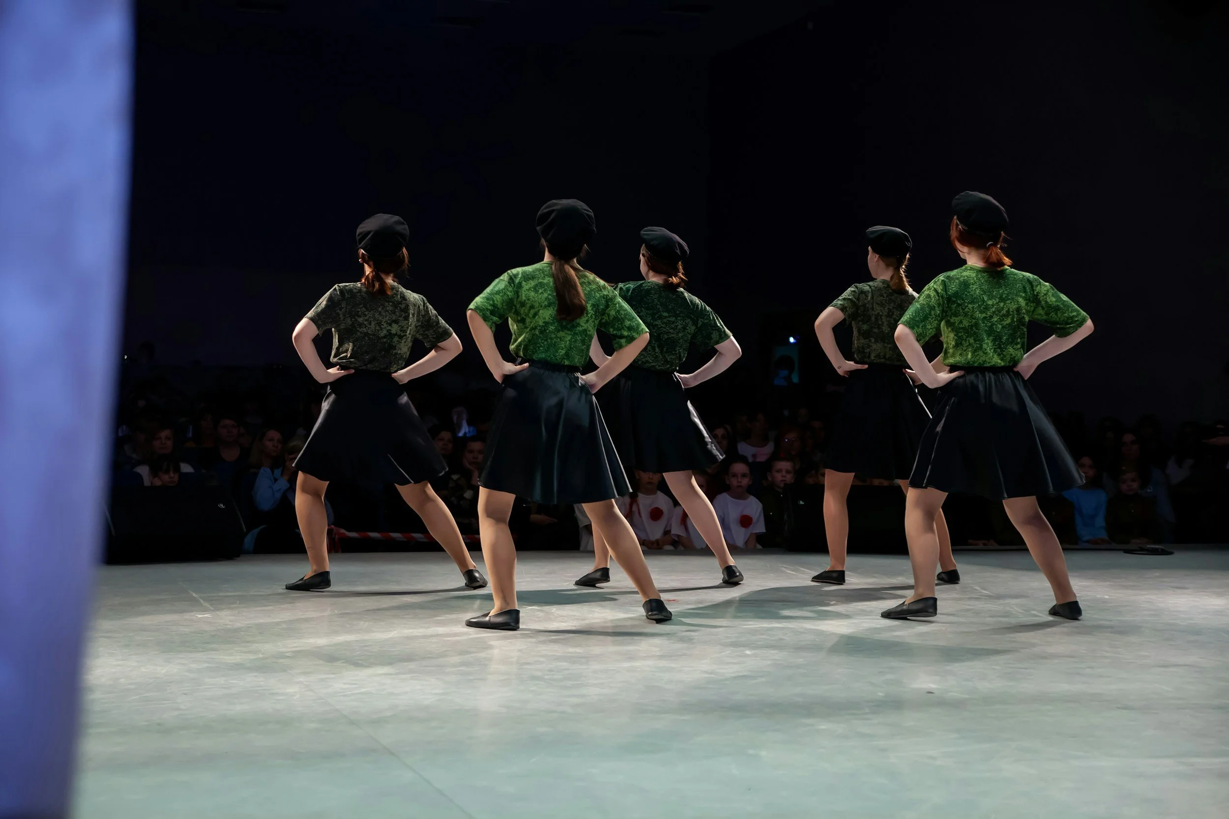 A group of students performing on on stage