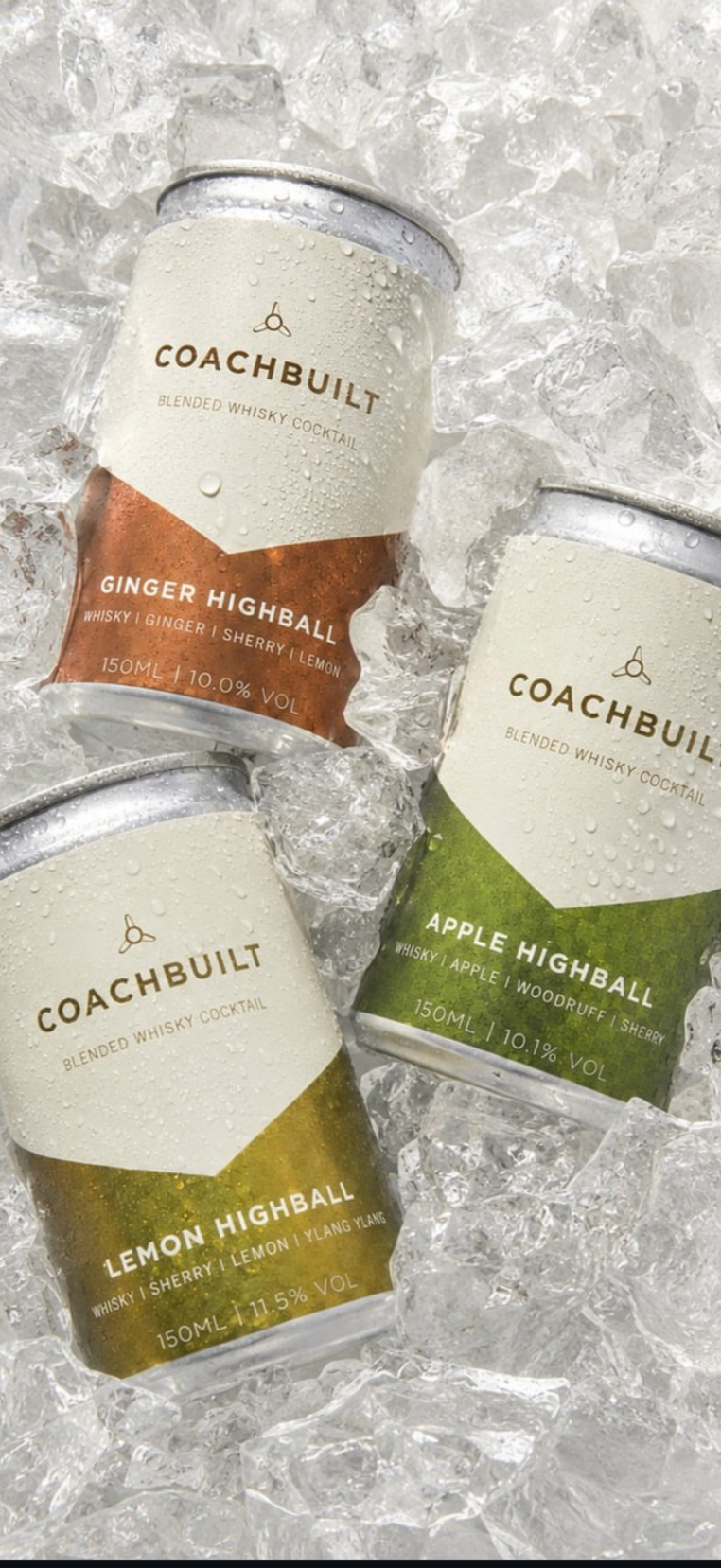 Three cans of Coachbuilt blended whisky cocktails lying on ice, with labels for Ginger Highball, Apple Highball, and Lemon Highball.