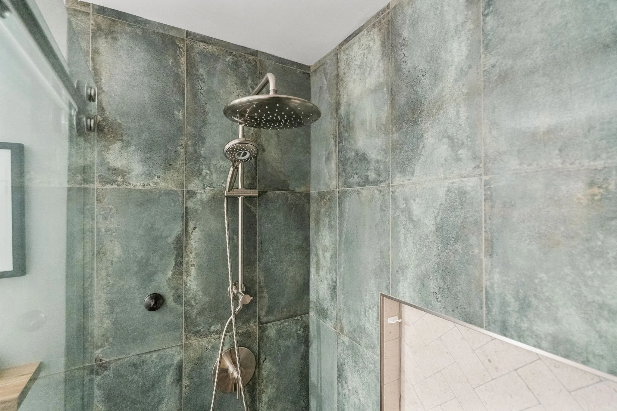 Angela Harris aquamarine tile and American Standard Spectra shower kit