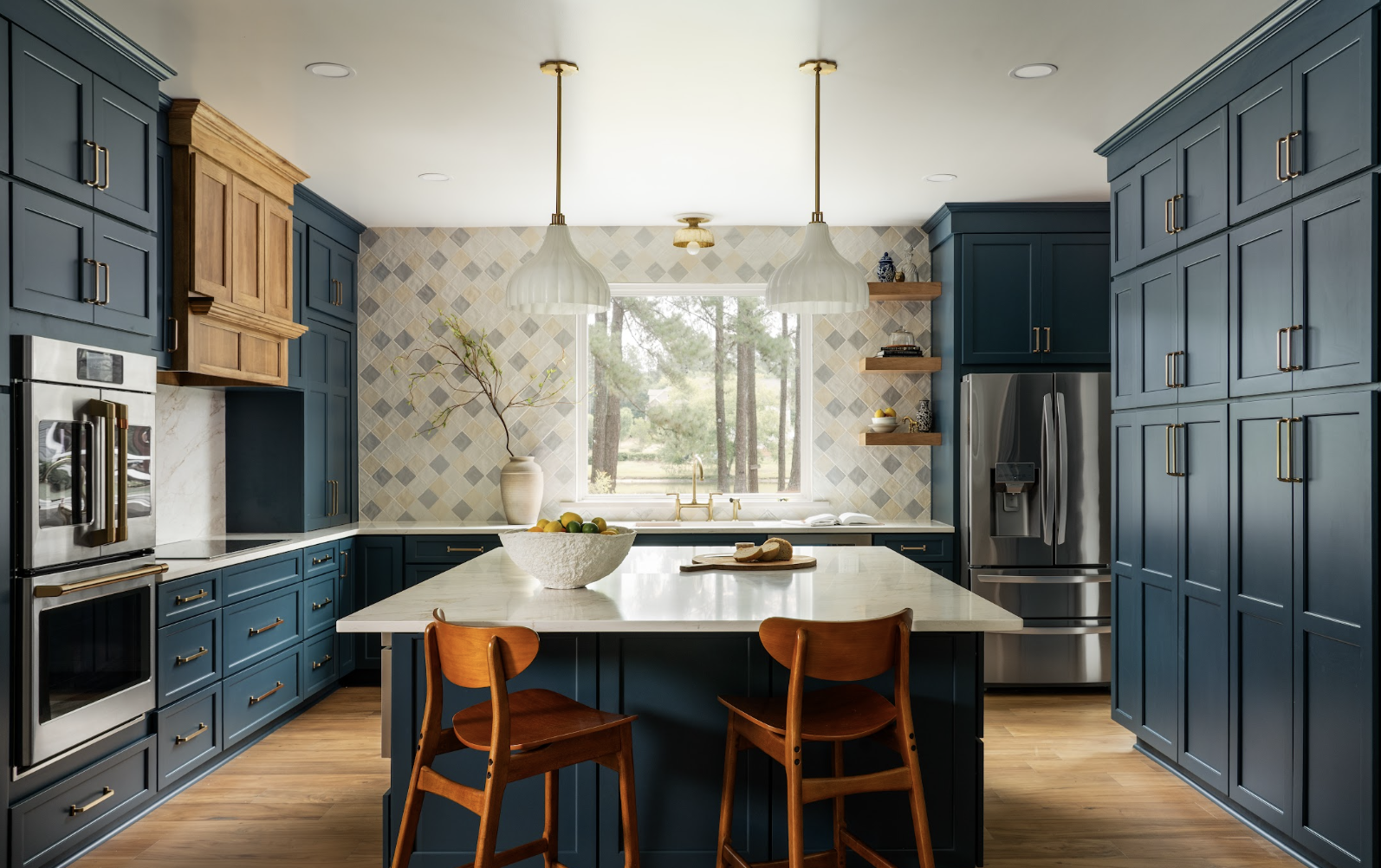 Dramatic blue kitchen with diamond tile backsplash