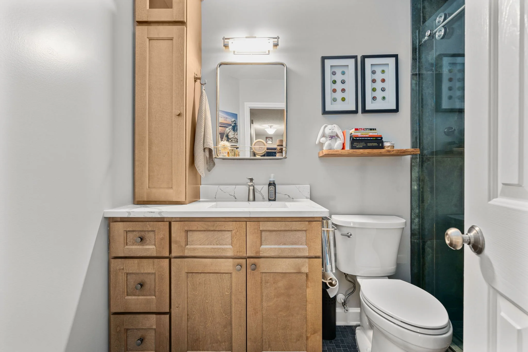 Hall Bath with vanity, shower, and decor