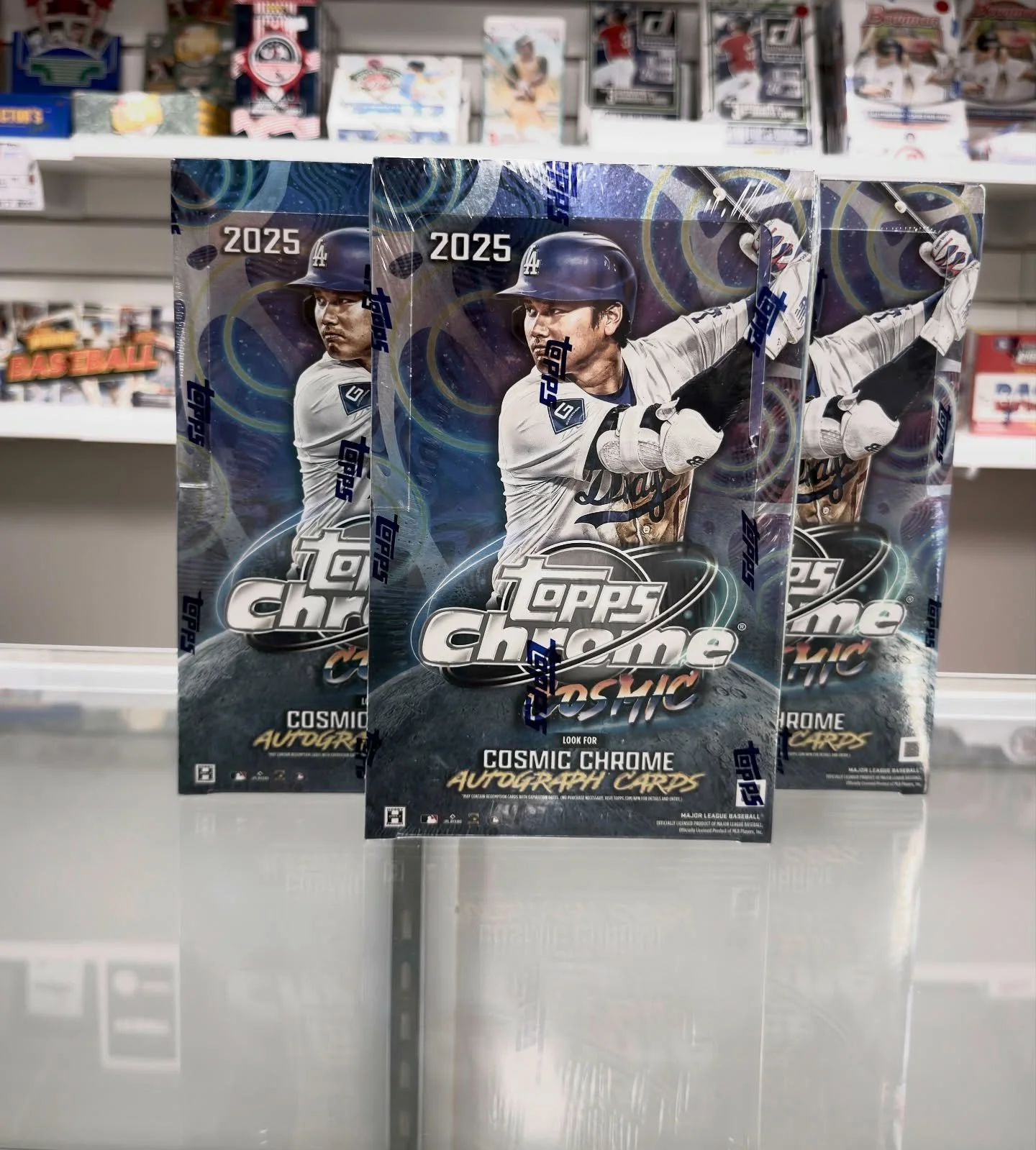 After flying off the shelves, @topps Cosmic Chrome is officially back at Cardboard Heroes. Boxes and packs are available now&mdash;perfect for ripping, chasing, or adding something unique to your collection. 

Grab yours while they last! 🚀