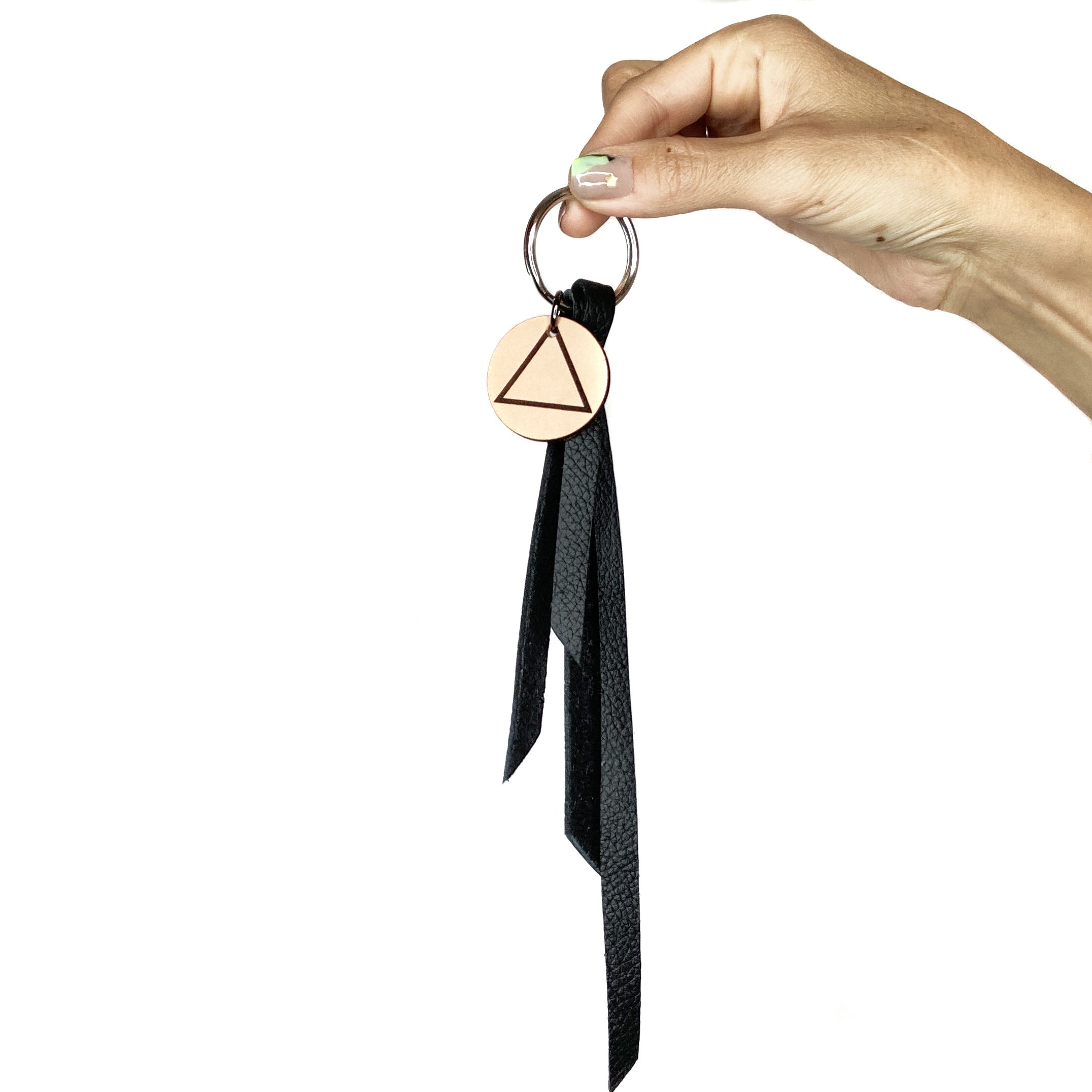 AA Black Keychain hand.jpg