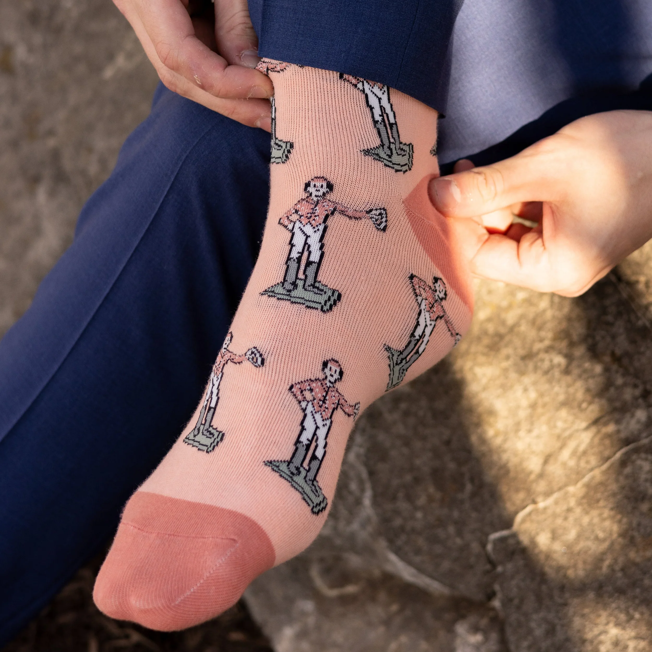 standing-jockey-peach-socks-worn.webp