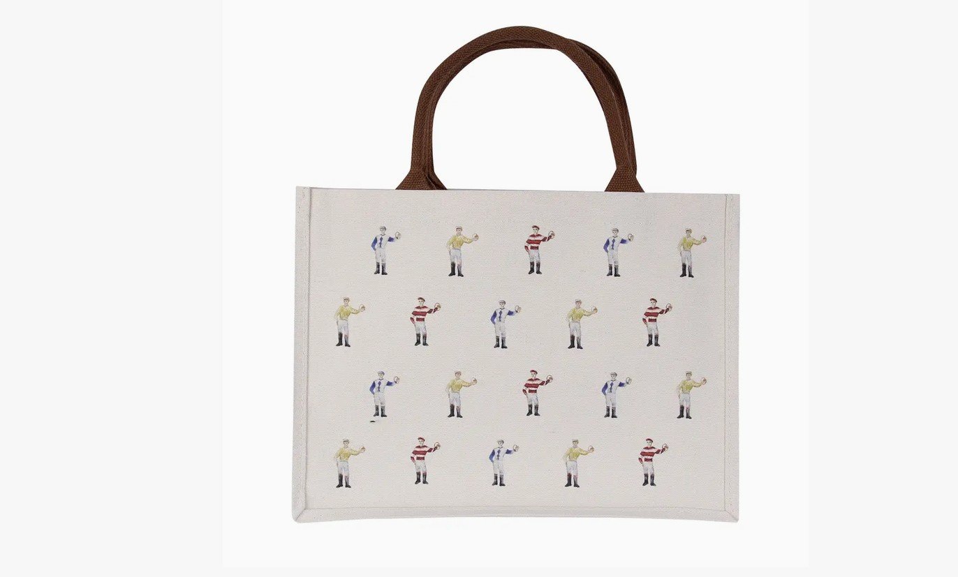 Standing Jockey Tote Bag featuring colorful horse racing jockeys in racing silks with brown handles, made in the USA.