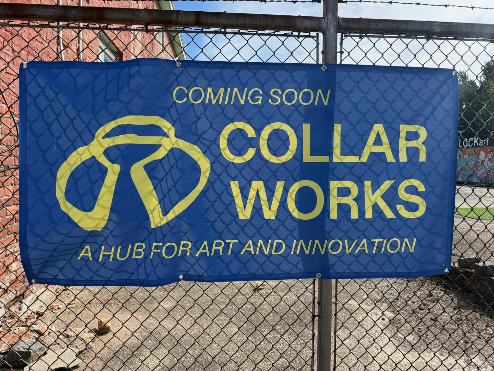 Collar Works blue and yellow tarp