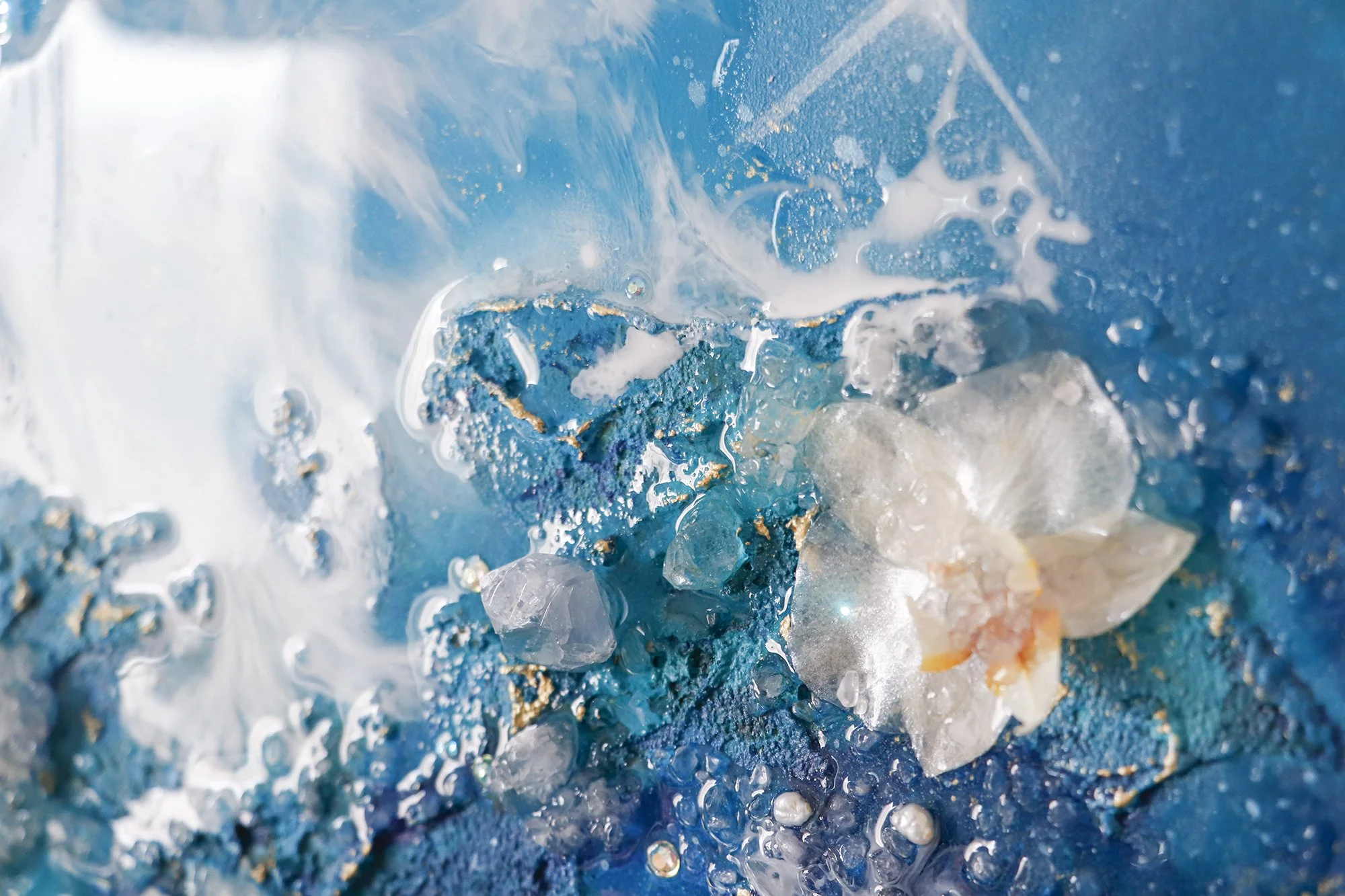  Luxury abstract painting detail, blue textured paint with a white orchid flower 
