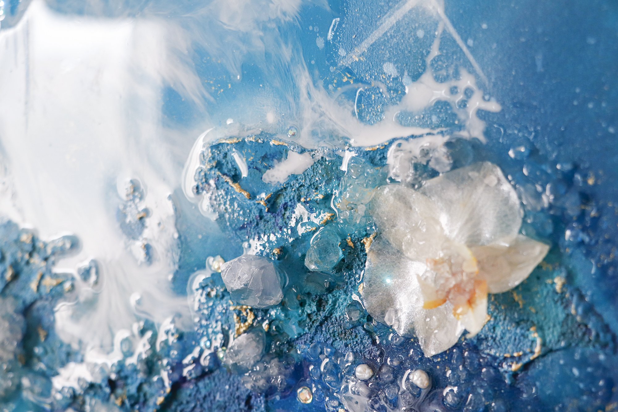  Luxury abstract painting detail, blue textured paint with a white orchid flower 