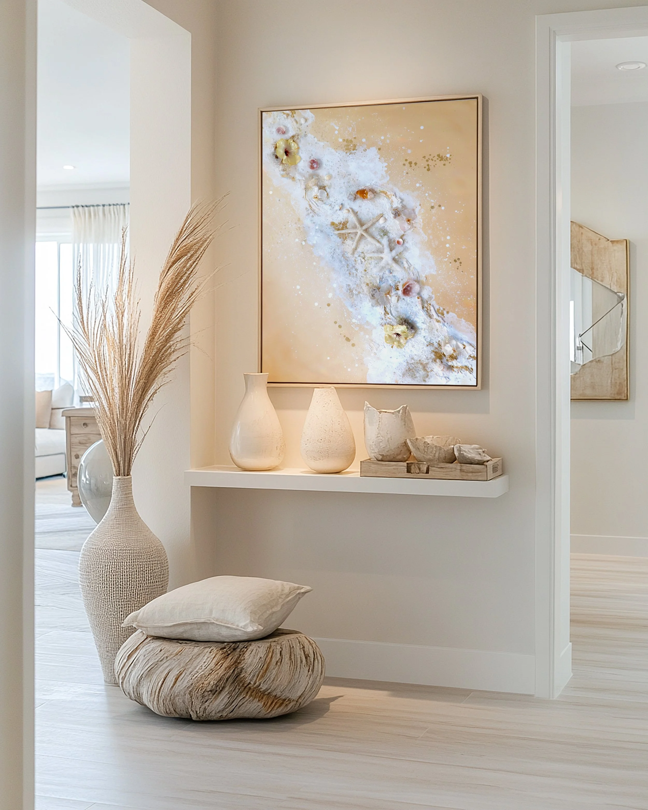 luxury beach abstract painting hanging on entryway wall, neutral gold tones