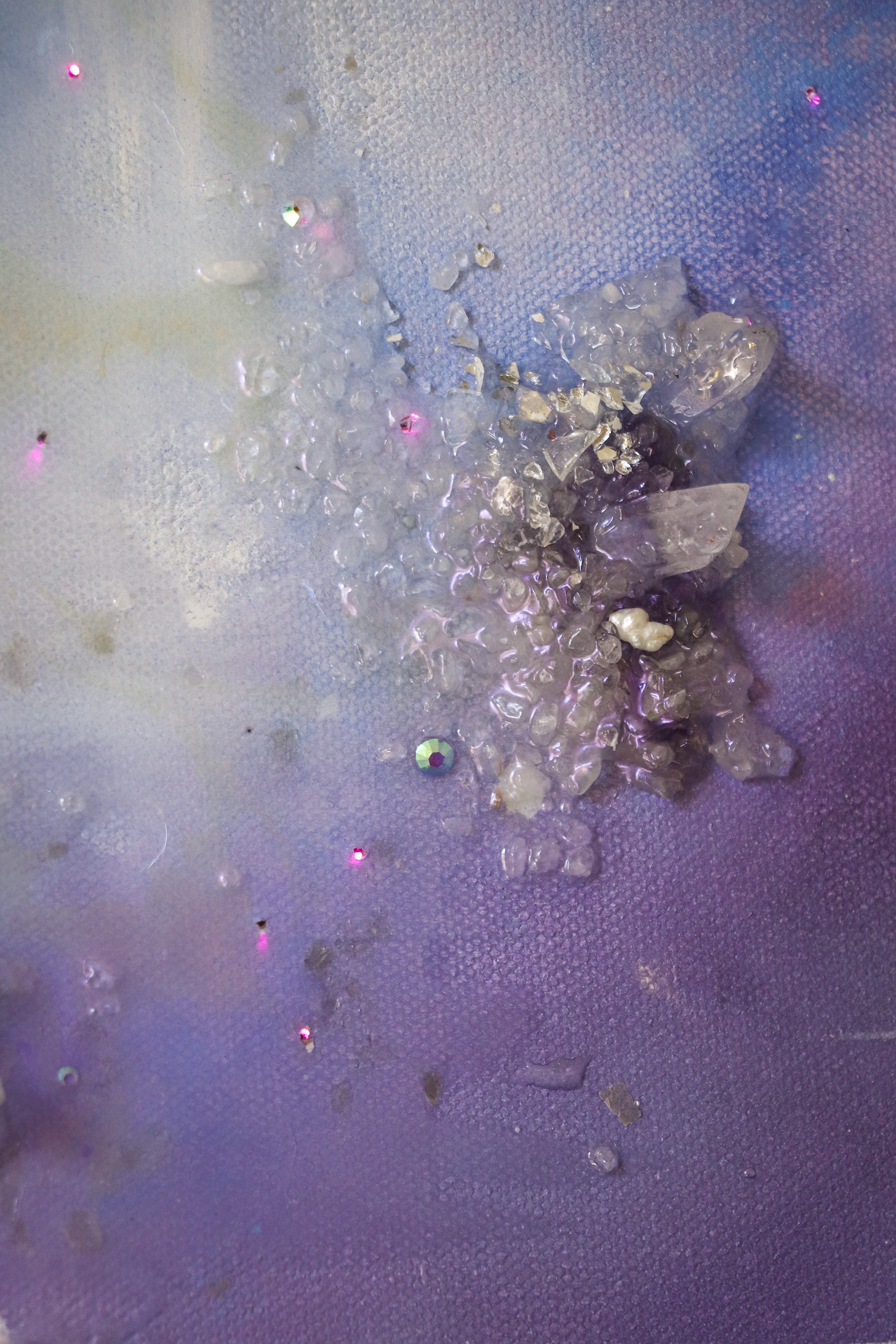 close up detail photo of quartz crystals, amethyst and Swarovski crystal rhinestone in resin art